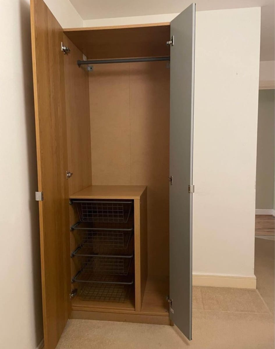 Hi I just bought that IKEA pax 75cm and it comes with the drawers. Any ideas on how you use that gap between the drawers and the side panel? Thank you