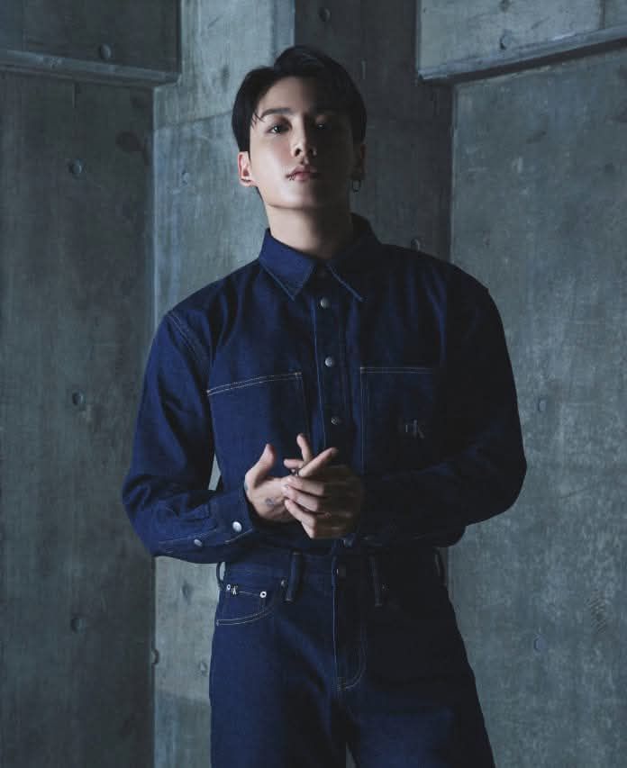 Jung Kook lights up statement denim. The signature trucker jacket