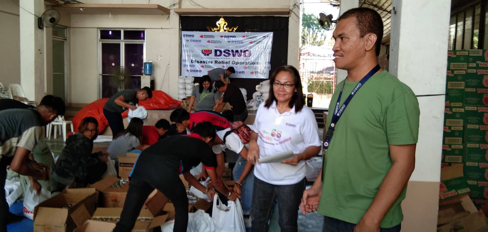 AT OUR REPACKING SITE IN ROXAS... - DSWD Western Visayas