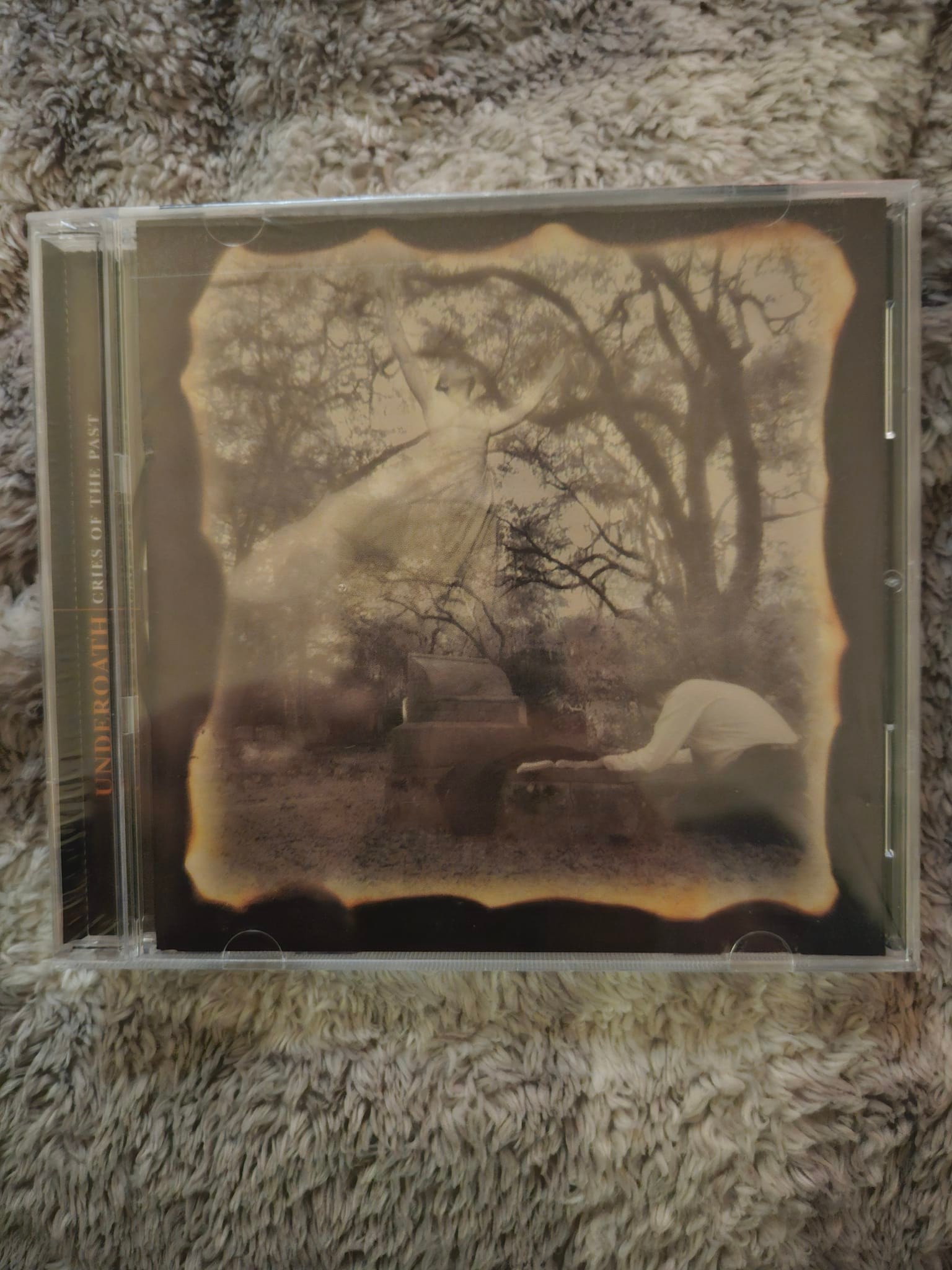 Where to find Underoath's albums Cries of the Past and Act of