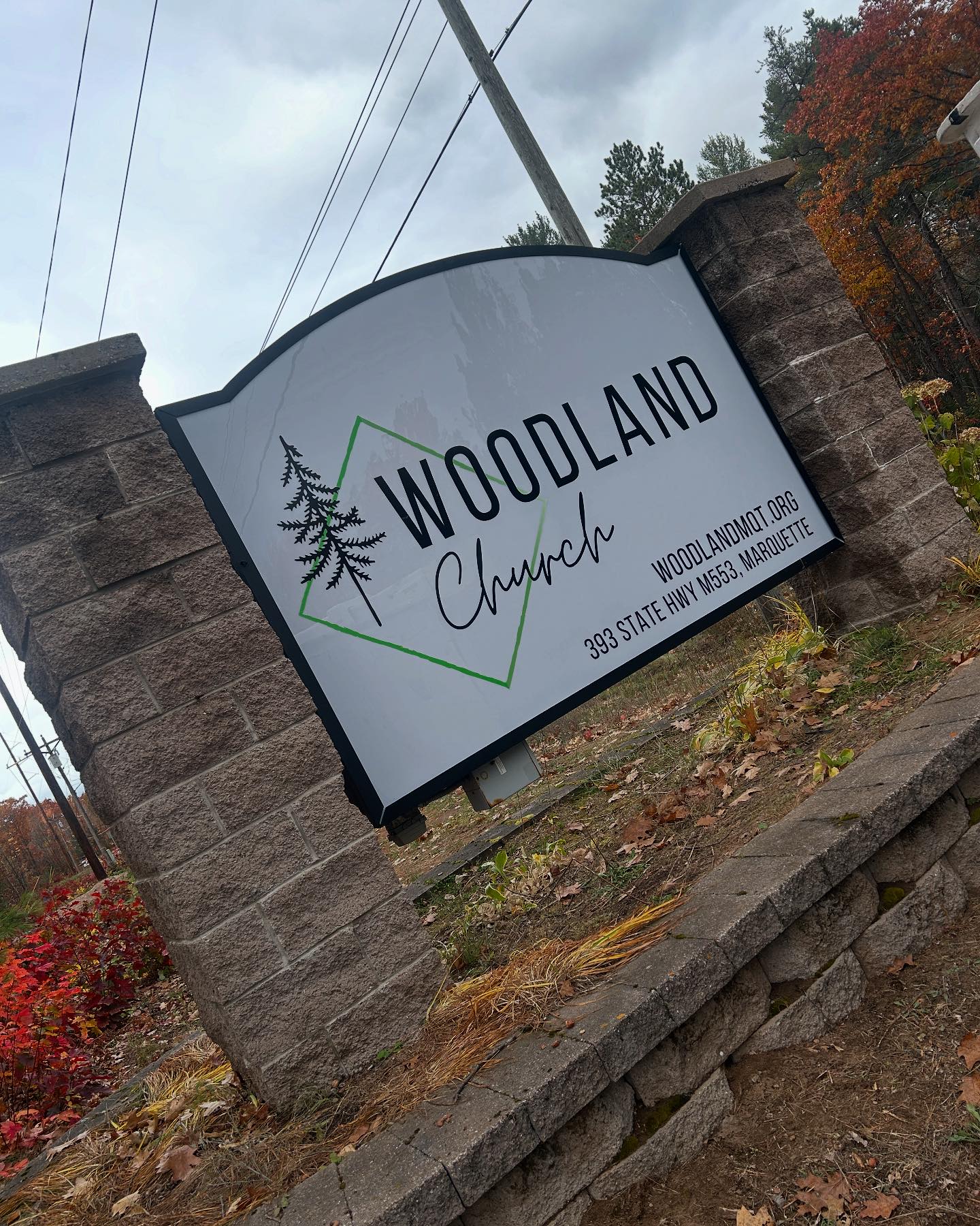 Woodland Church has a new sign and location.