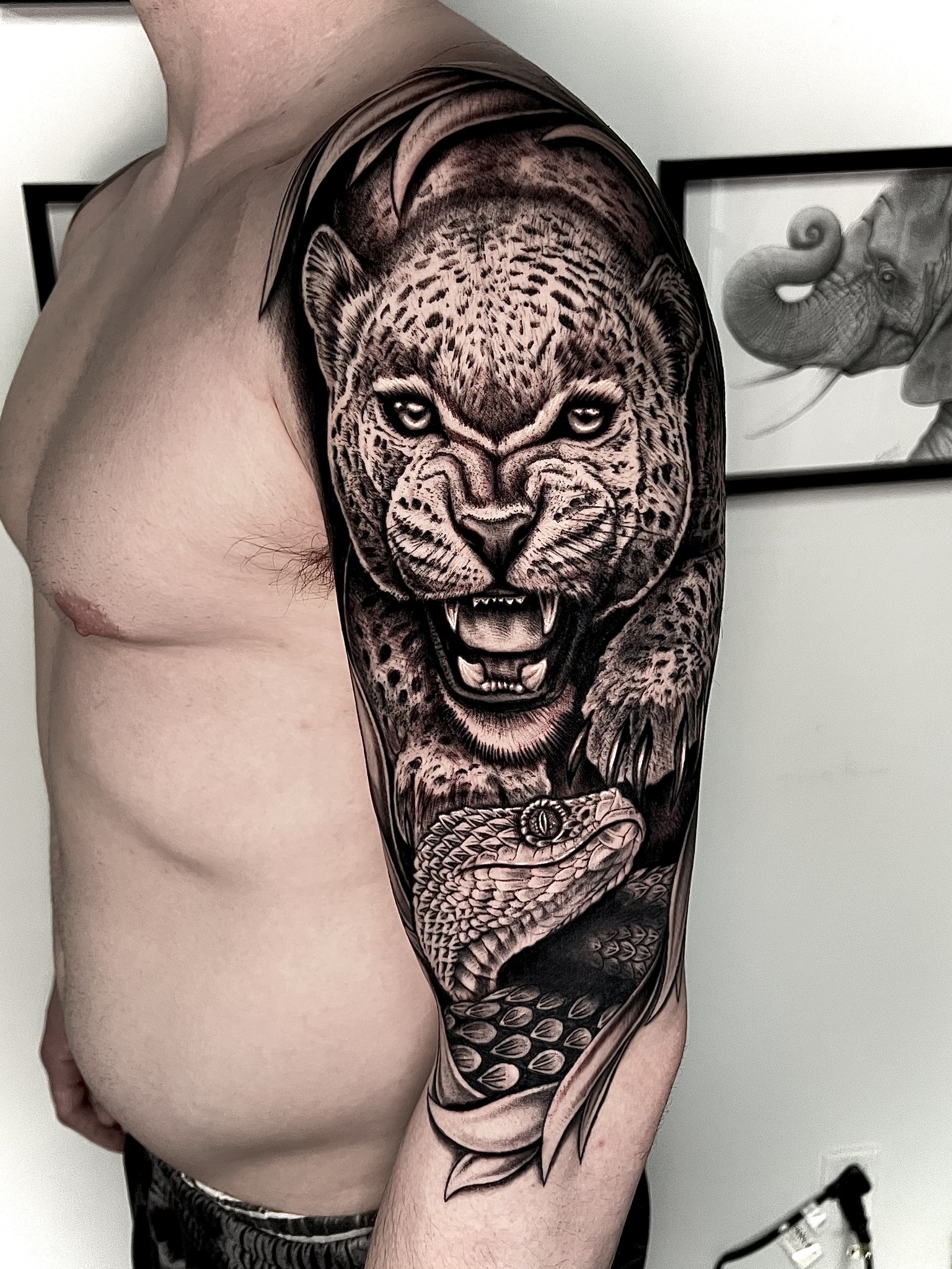 Leopard and snake tattoo by Daniel! - Lost Lantern Tattoo Co.