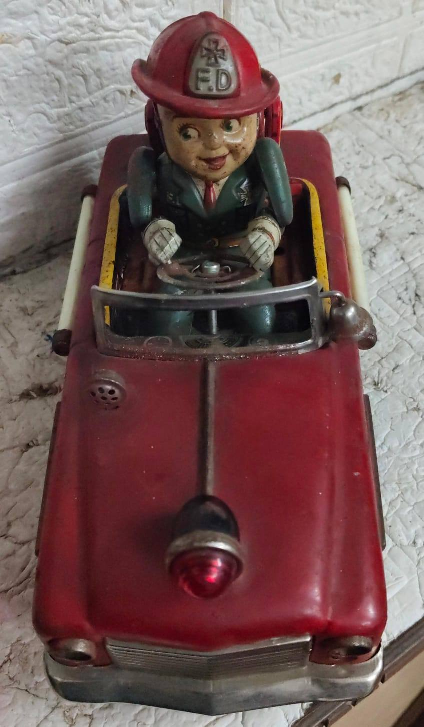 Vintage Nomura Fire Chief toy car from 1950s-60s
