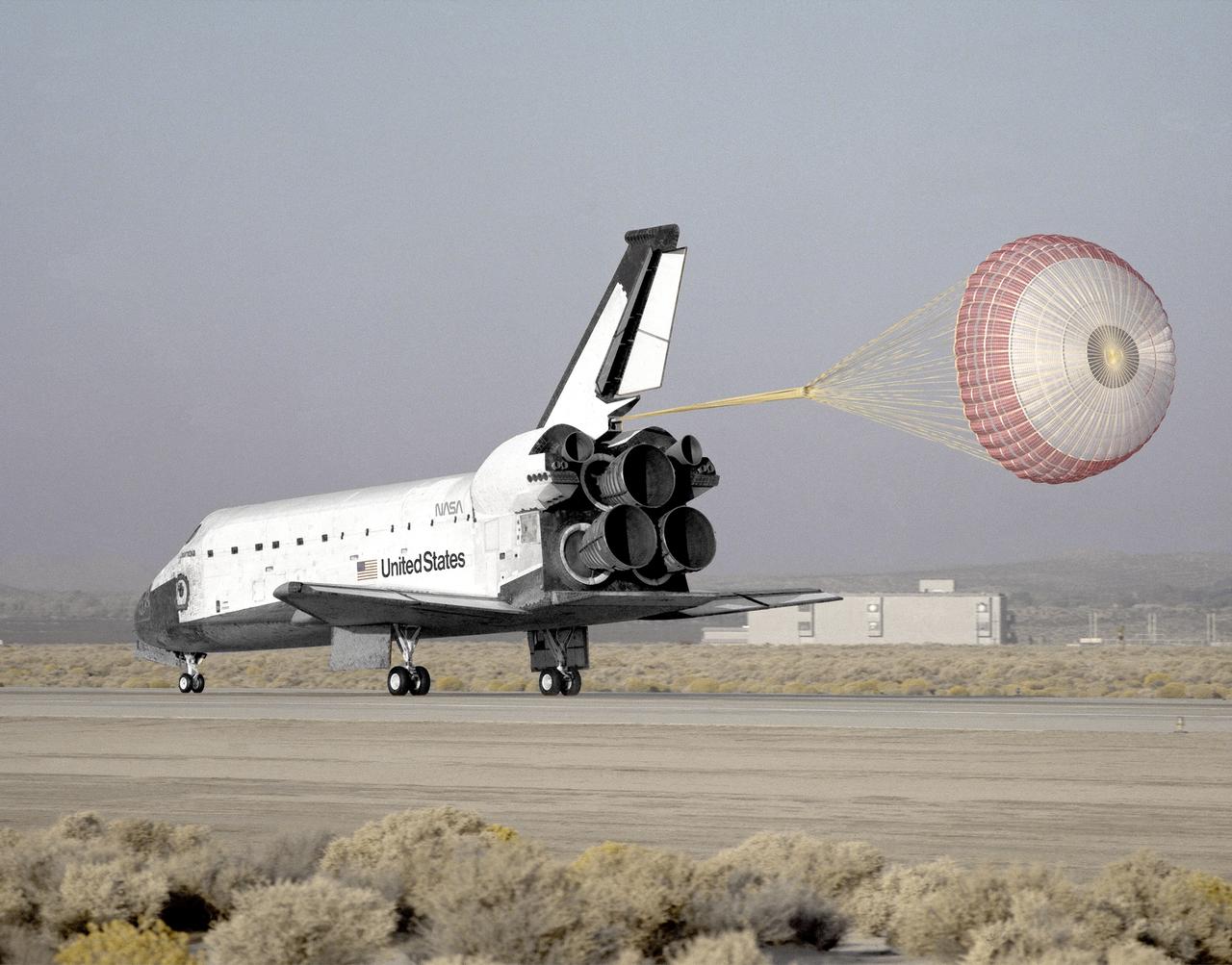 Space - A drag chute slows the space shuttle Columbia as it rolls to a ...