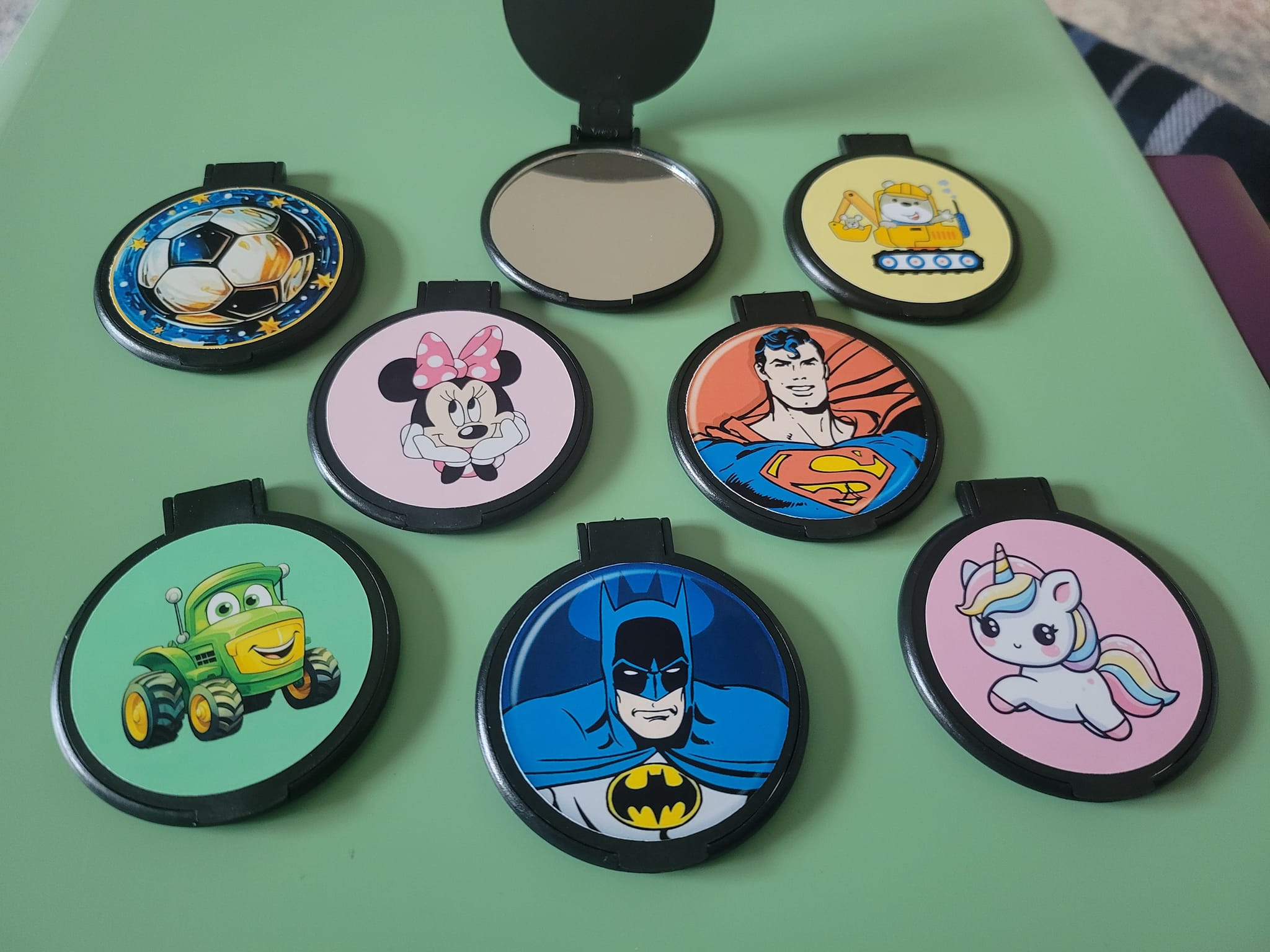 Adding fun to compact mirrors with custom stickers