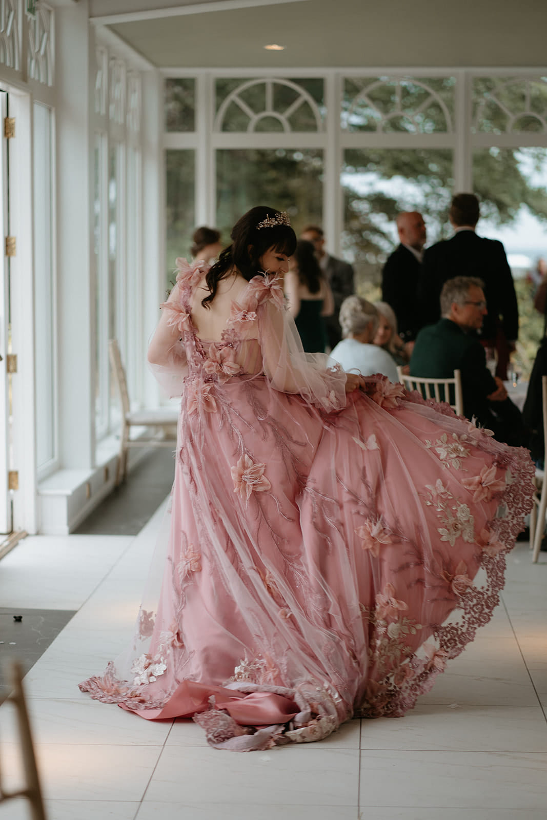 Dreamy fairy-style wedding with pink dress and floral cake