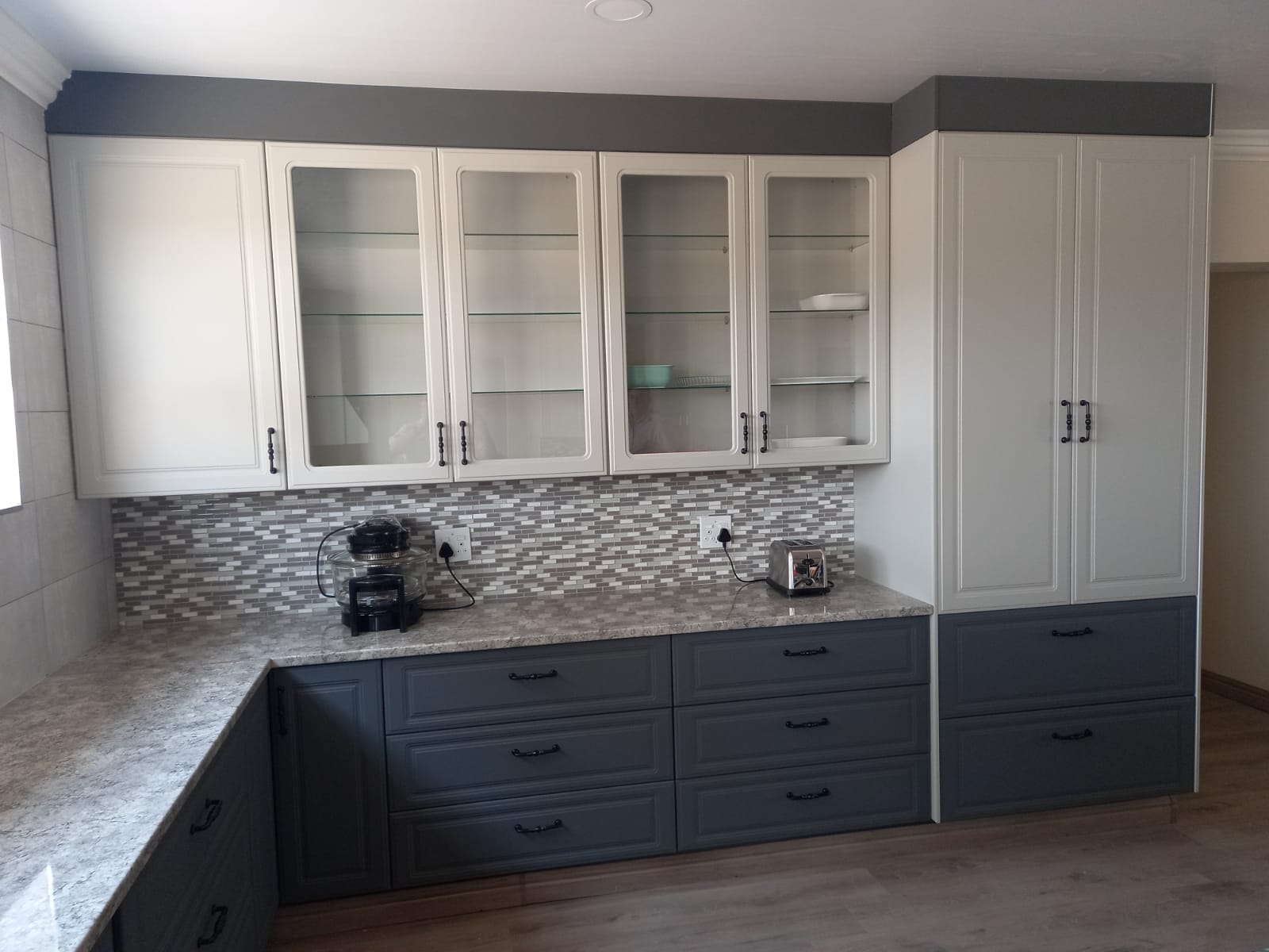 What kitchen cabinet trends are replacing white cabinets?