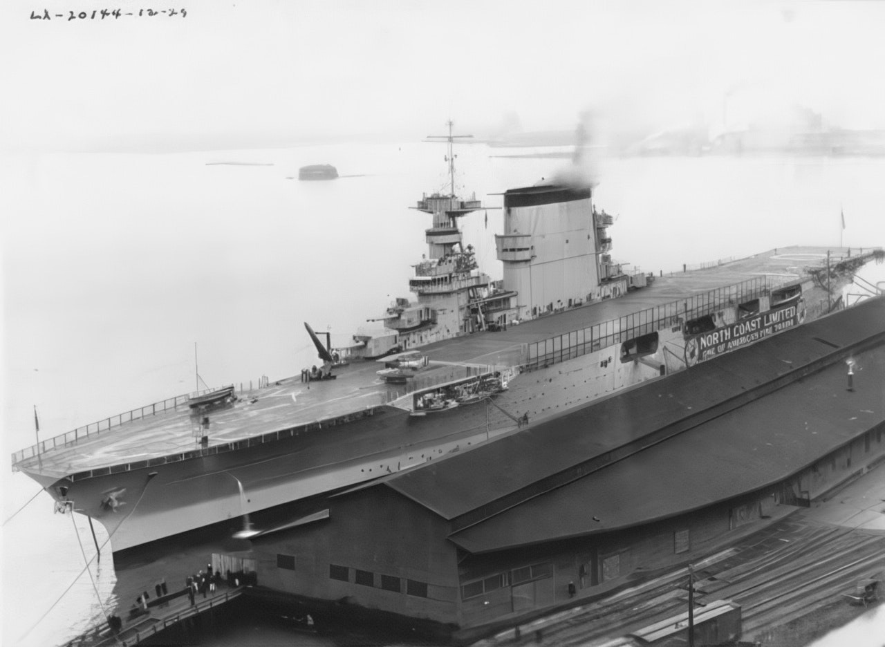 USS Lexington (CV 16) pictured underway recovering aircraft on