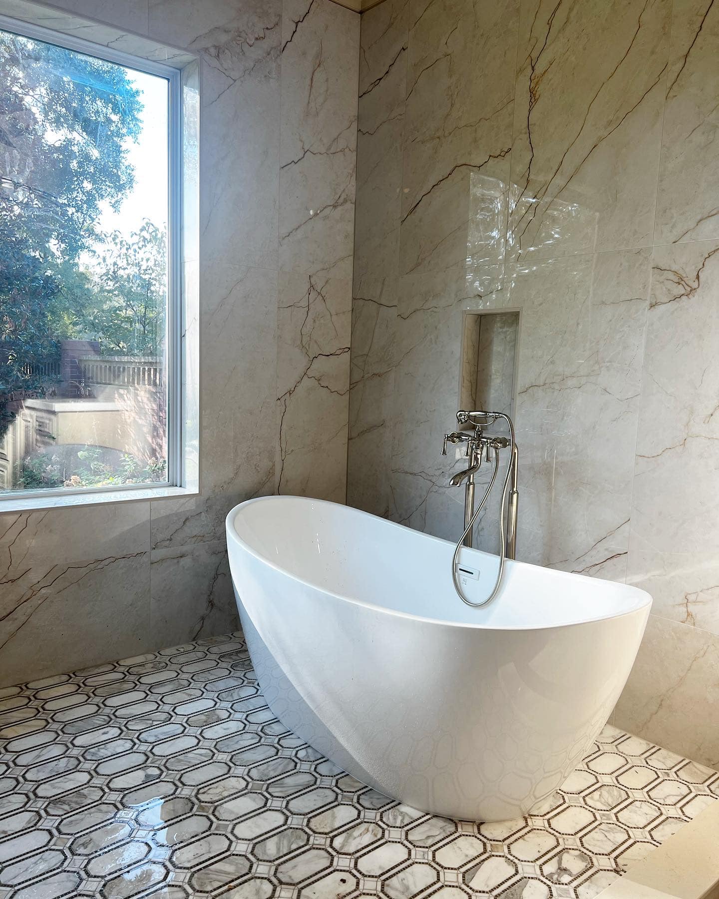 The tub has arrived in this... - Strickland Interiors