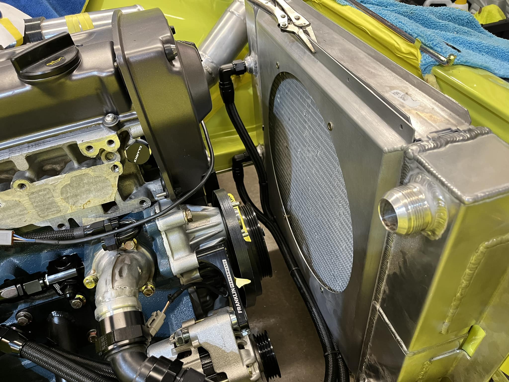 Yellow - Fan shroud and oil cooler lines mocked up on the radiator. The ...
