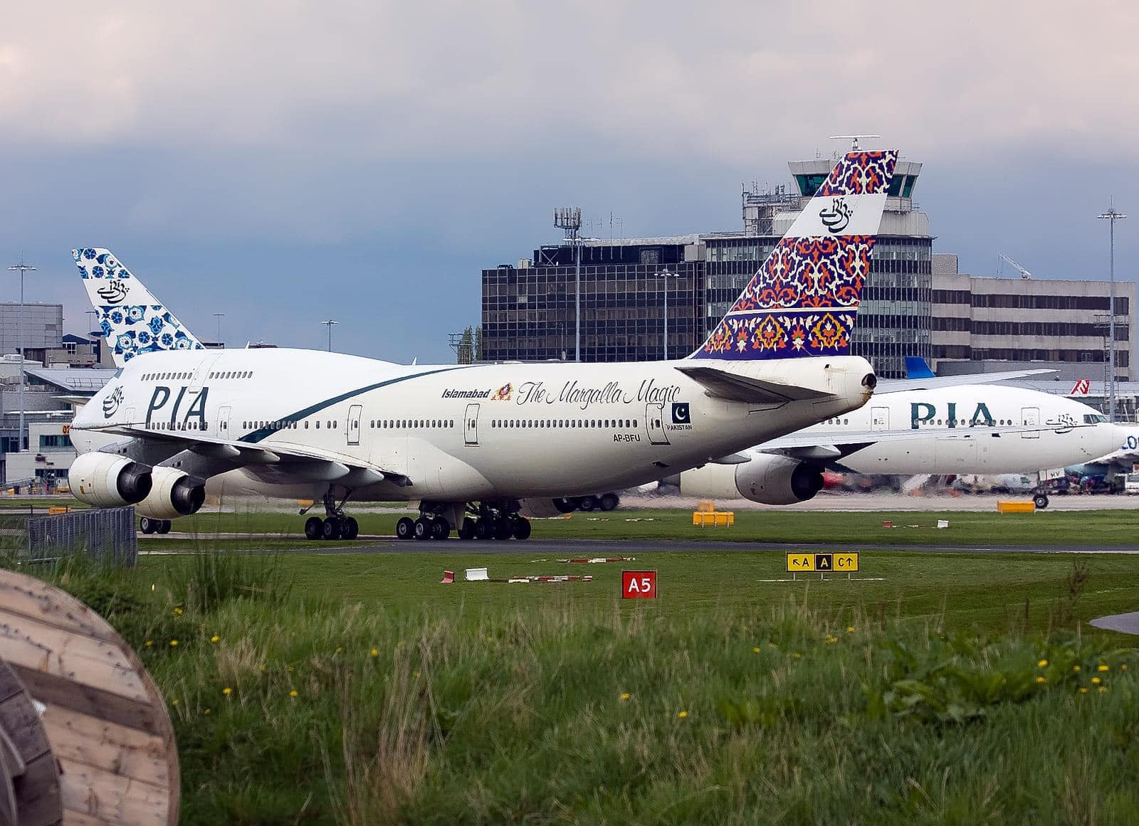 A Pakistan International Boeing 747-200B. Wearing the colourful
