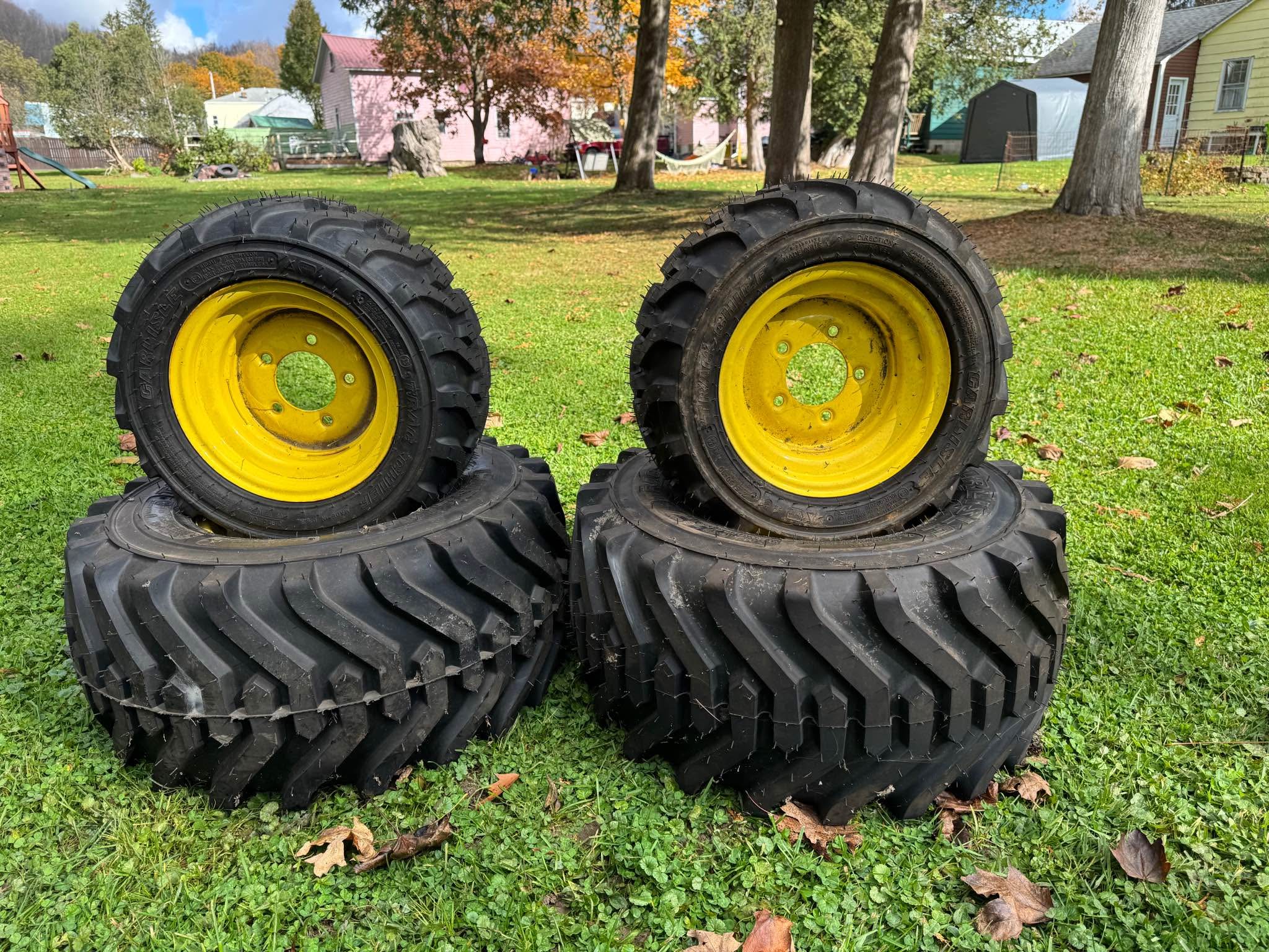 R4 industrial Tires and Rims off a John Deere 1000 Series compact ...