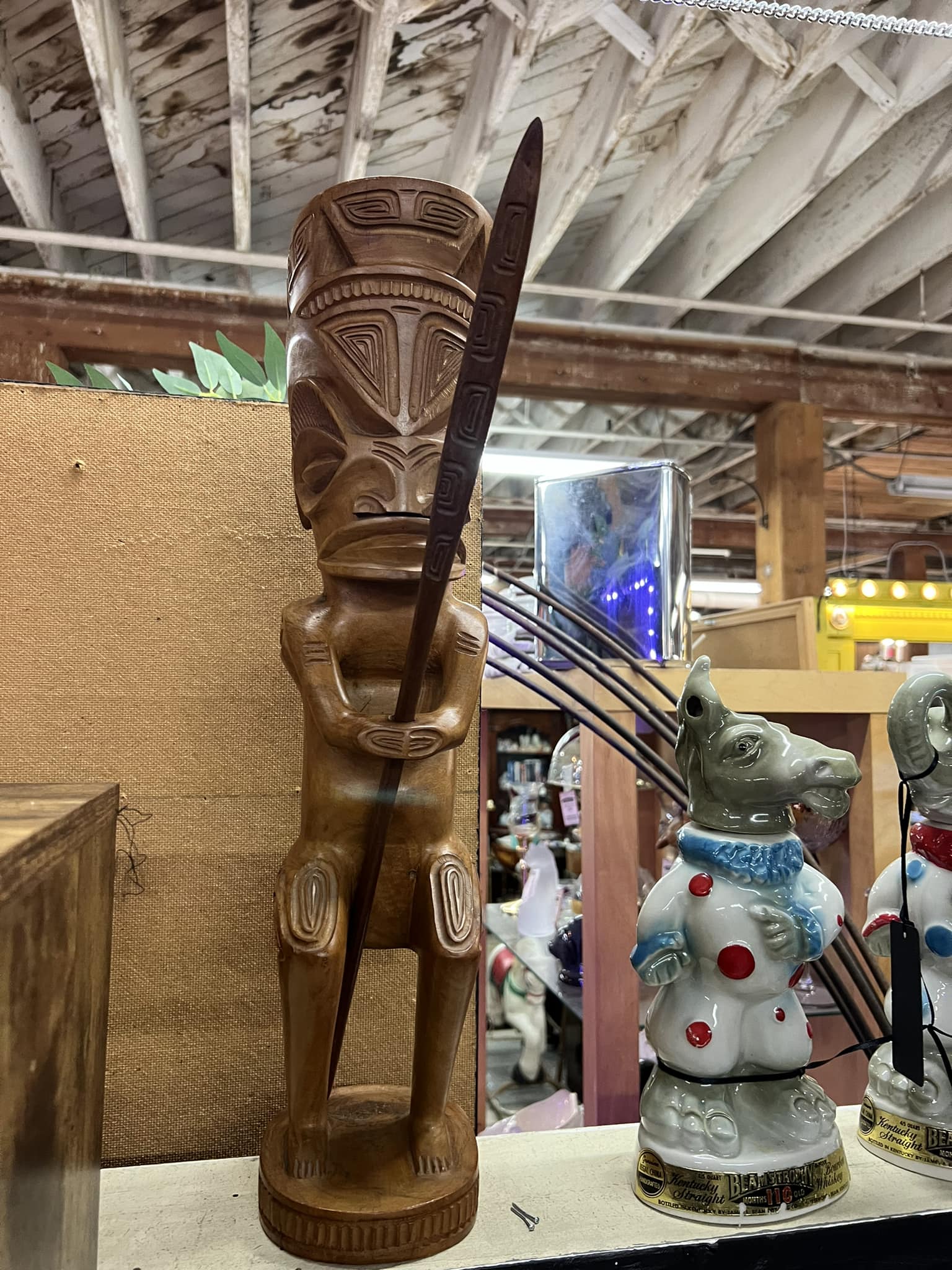 Is a two-foot hand-carved figure considered tiki?