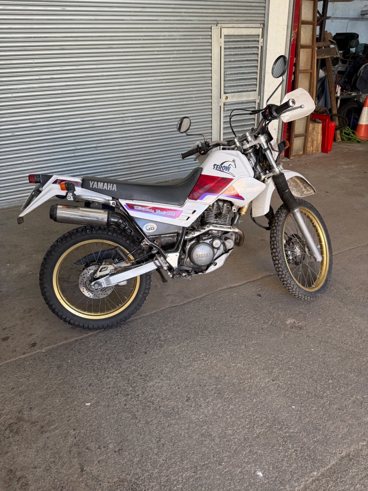 The 1995 Yamaha XT225 Serow is a lightweight dual-sport motorcycle 