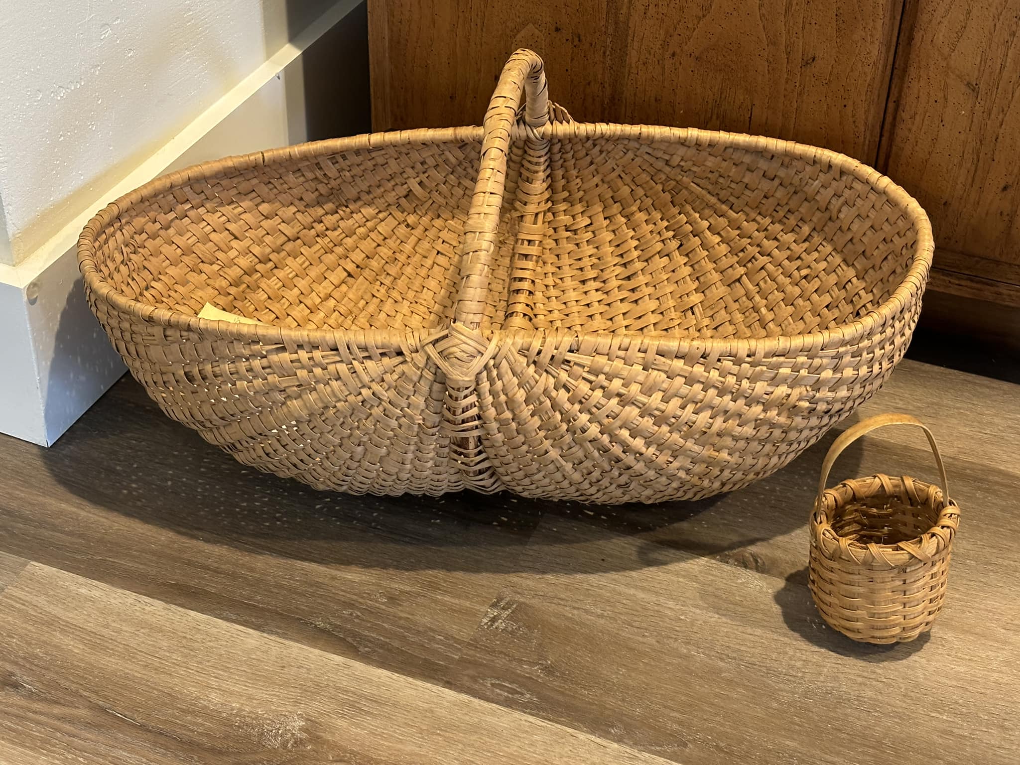 What is the origin and date of this antique basket?