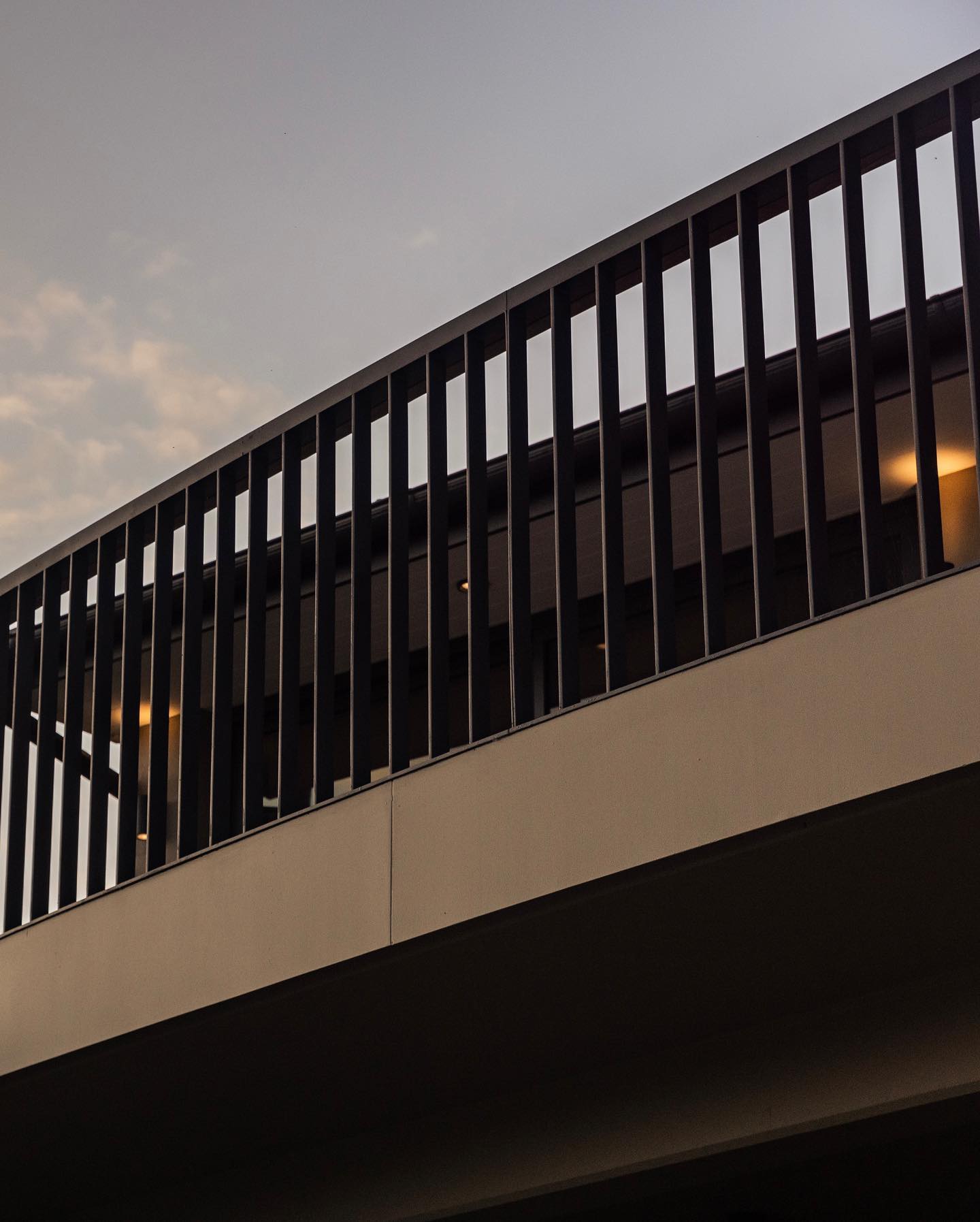 Boom Build - The curved steel balustrade creates a...