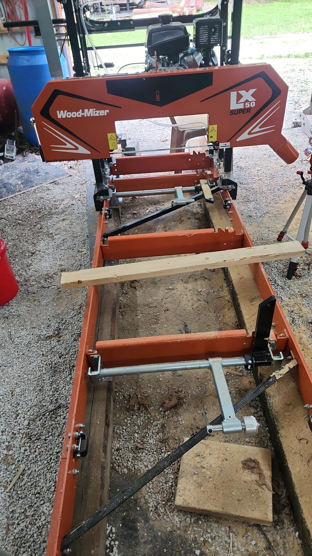 How to configure LX50 Super sawmill for sawdust dump direction?