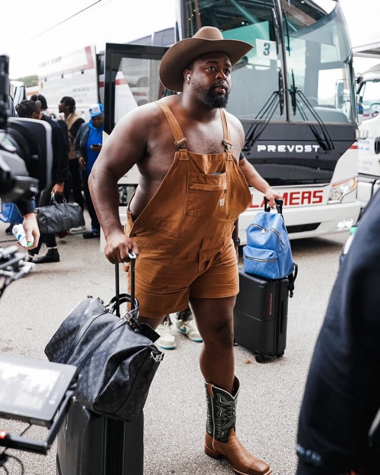 Lions DT Benito Jones was rocking overalls and boots as he arrived