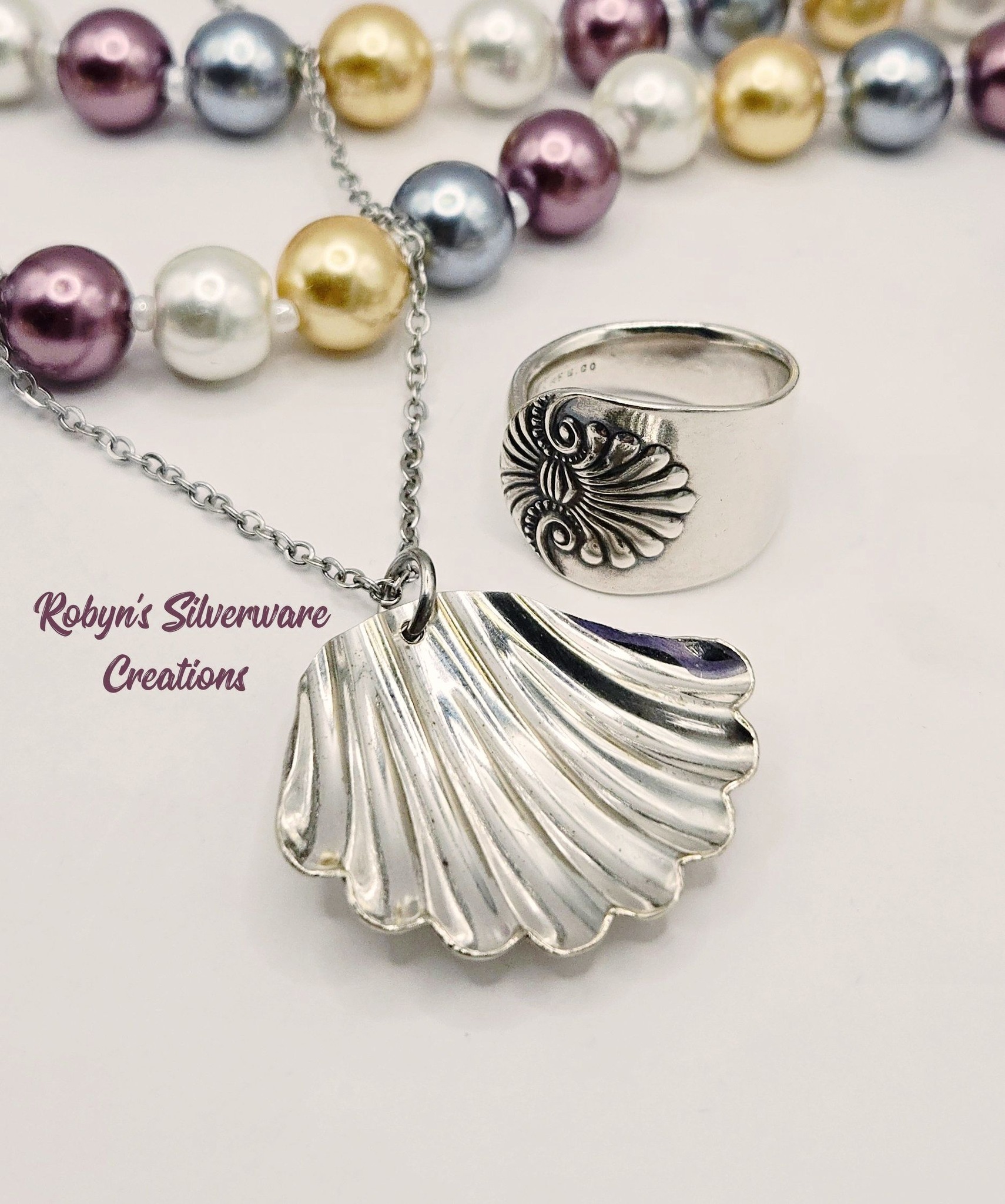 Robyn's - (SOLD) A shell pendant and ring made from a silverplated ...