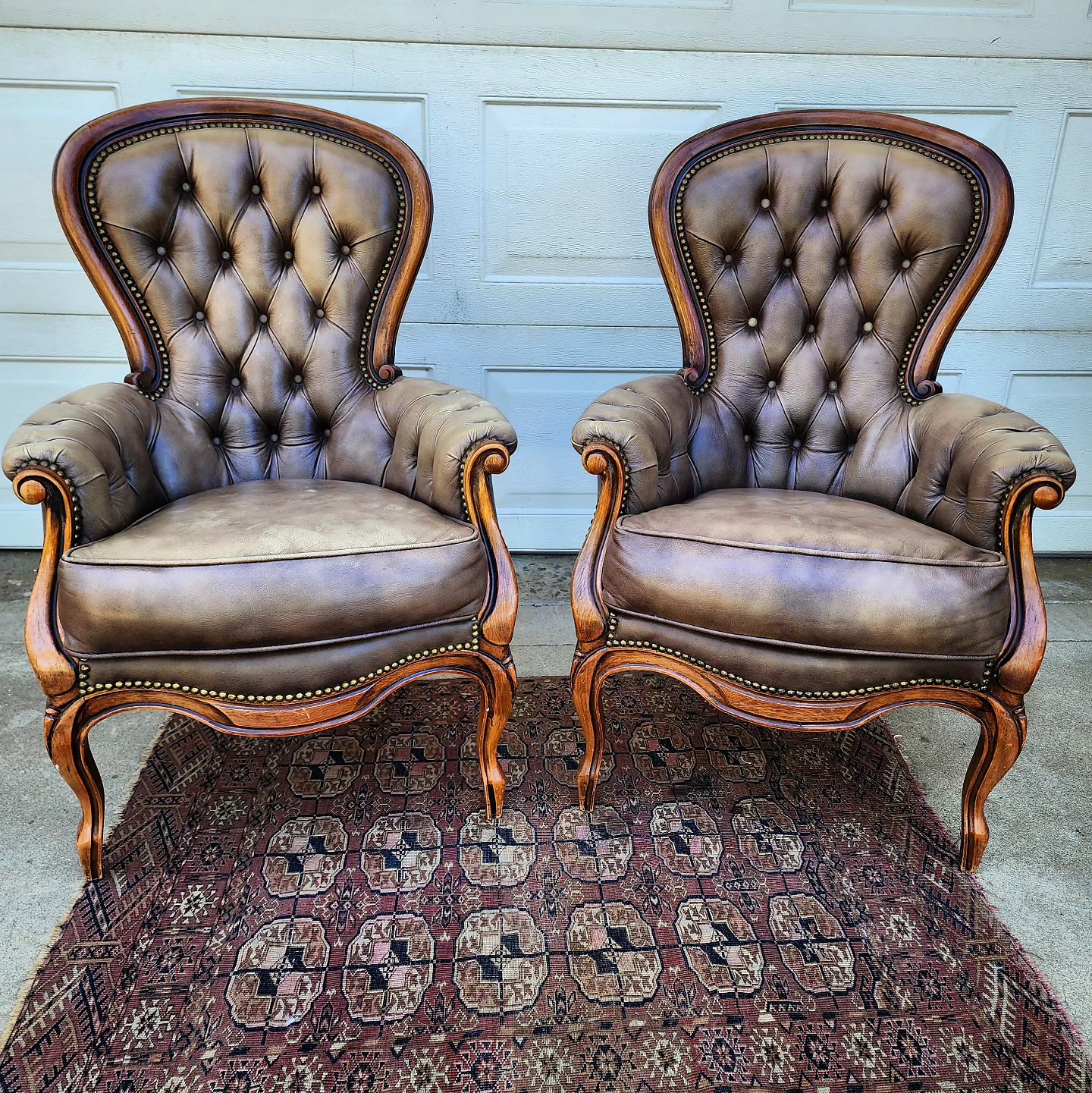 These dining chairs were designed by French designer Jacques Adnet