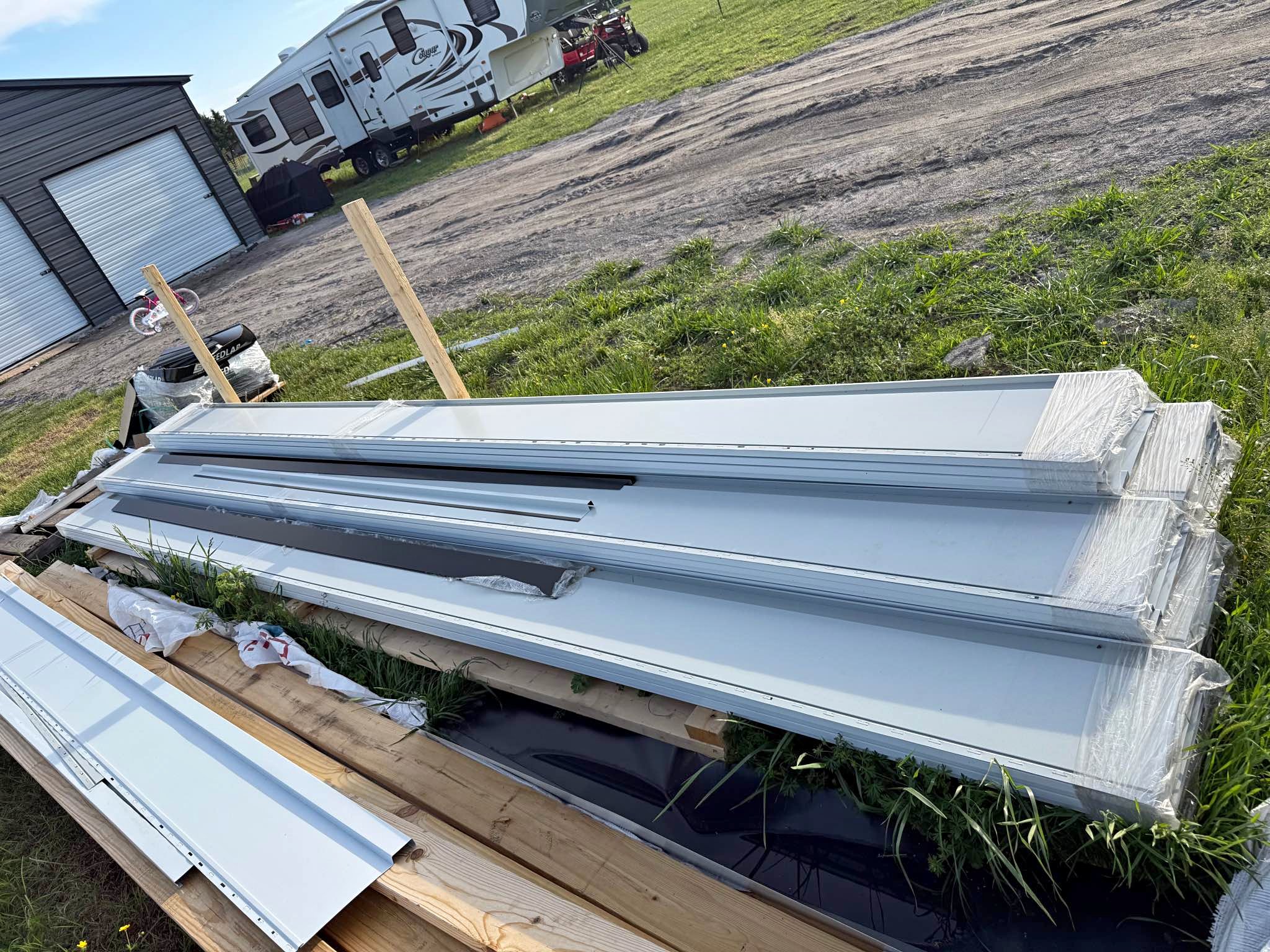 Leftover board and batten metal siding white in color - Miscellaneous ...