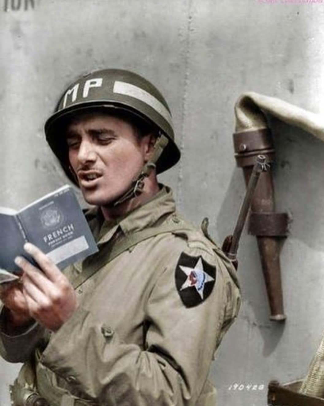 Vito - Pfc. Rocco Festa of the 2nd Infantry Division, reads his newly ...