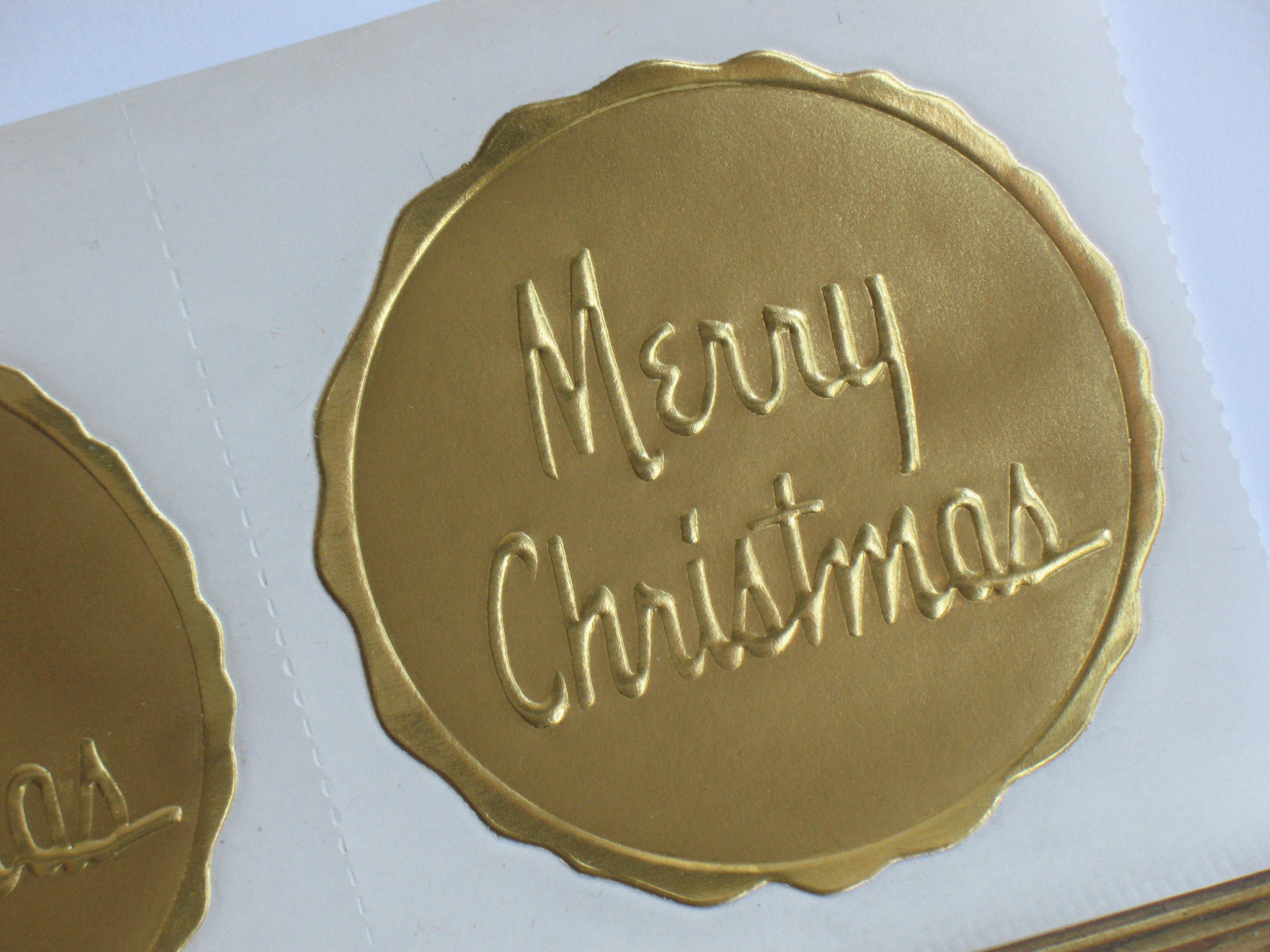 This all gold embossed Merry... - K.C. Decorative Seal
