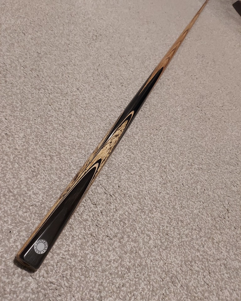 Richard Chudy's Dancing Wings cue with sapele wood and abalones