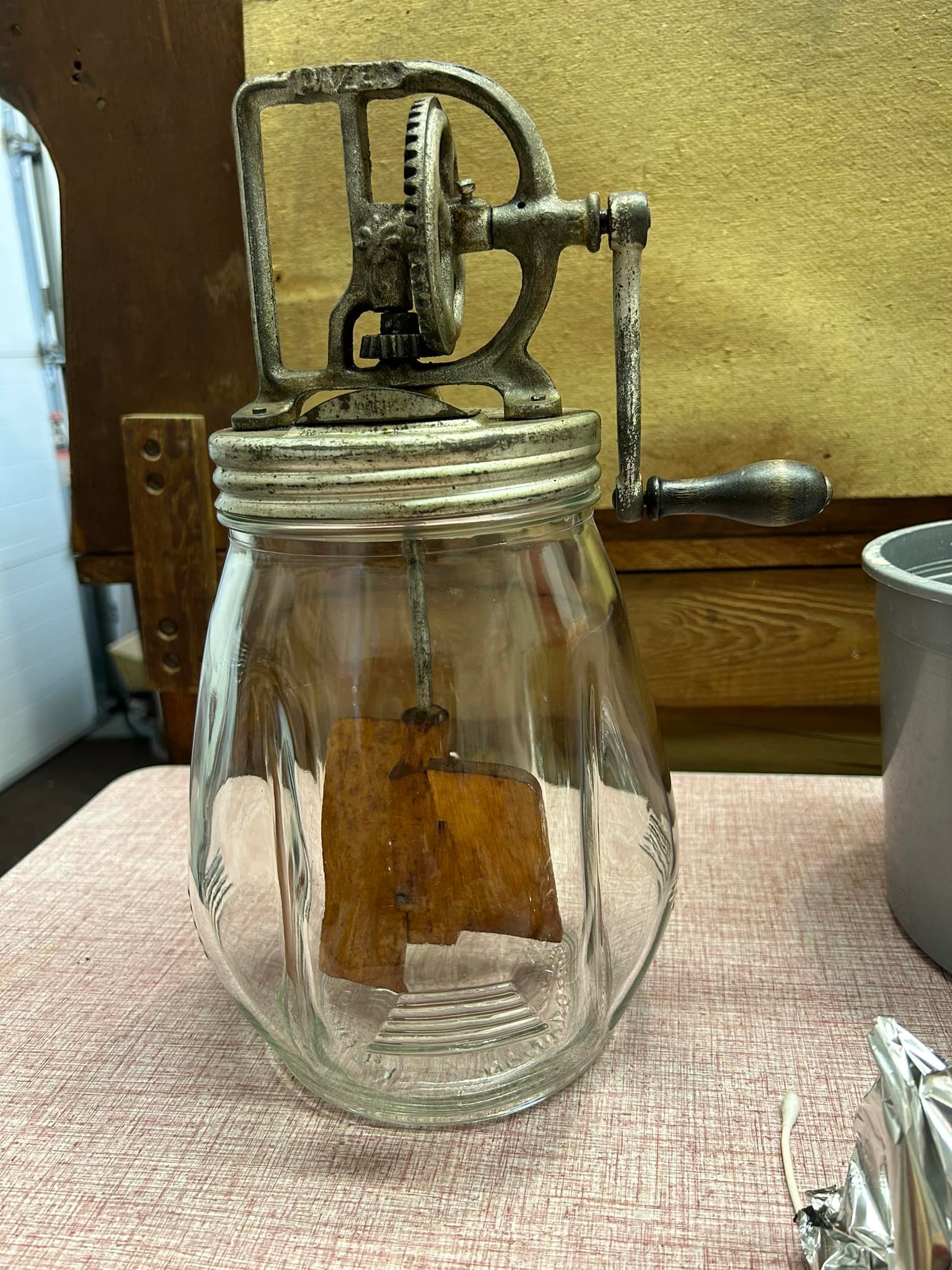 What are the age and value of these Dazey tulip jar butter churns?