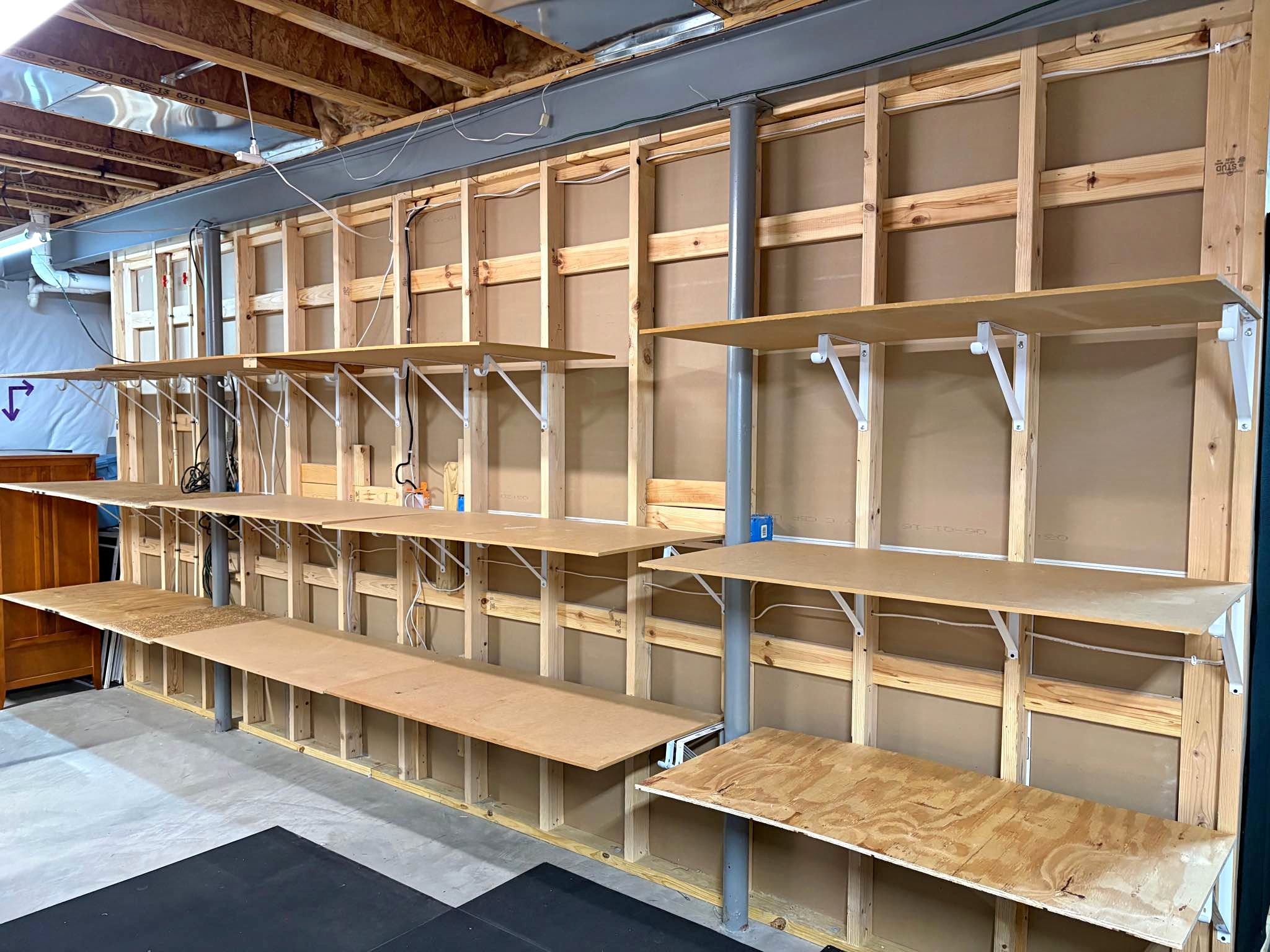 garage storage shelving OSB and plywood with L brackets - Closet