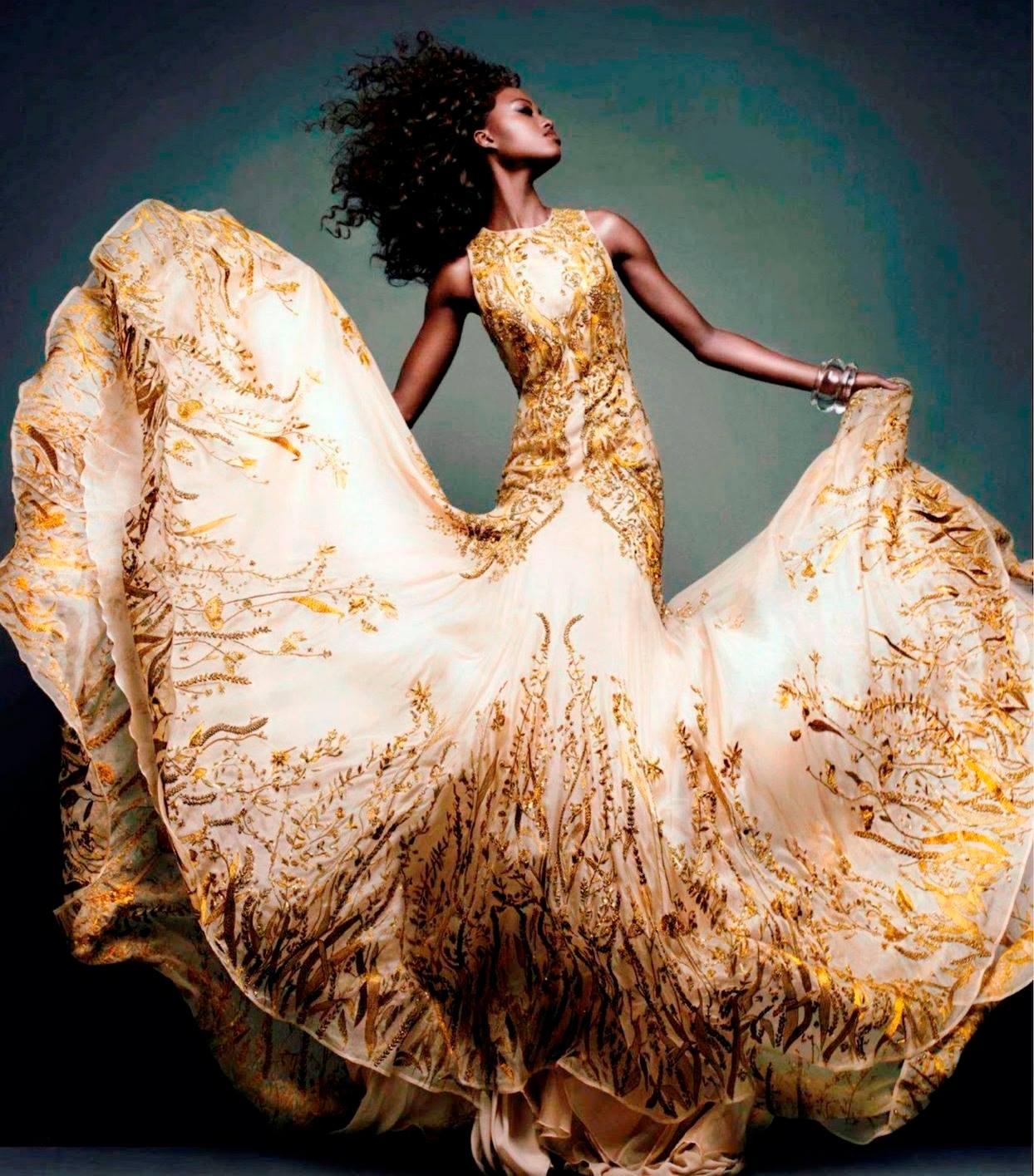 alexander mcqueen gold dress McQueen, dress, Autumn-Winter 2010-11, ready-to-wear Hand embroidered embroidery with black beads and crystals. Metal flowers and grey pearls on the shoulders and cuffs. This was part of the last iconic alexander mcqueen dresses