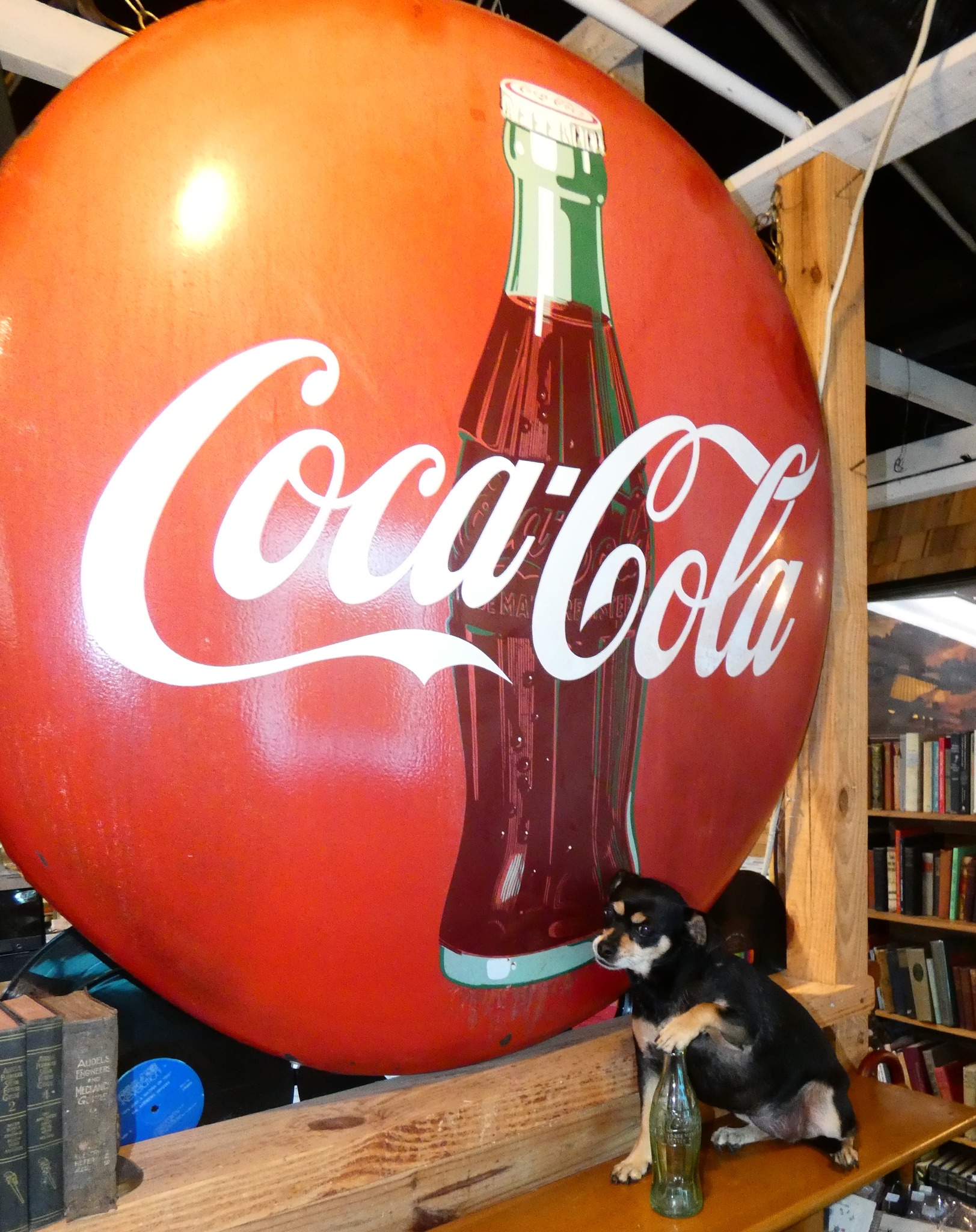 Vintage Buddy Lee doll promotes Coca-Cola in 1950s businessman attire