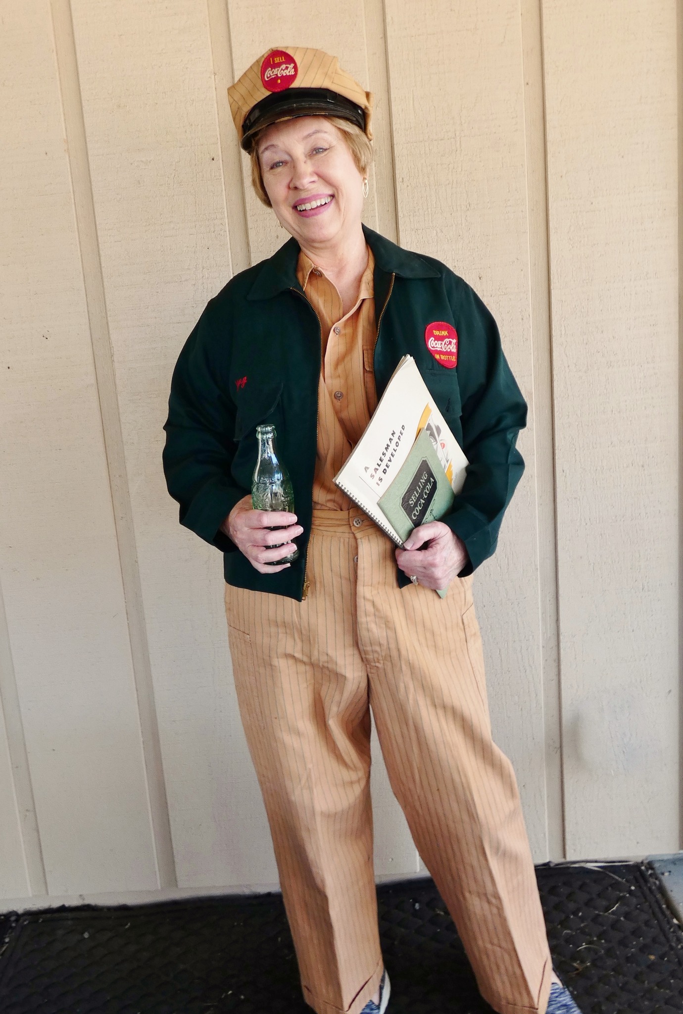 Vintage Buddy Lee doll promotes Coca-Cola in 1950s businessman attire