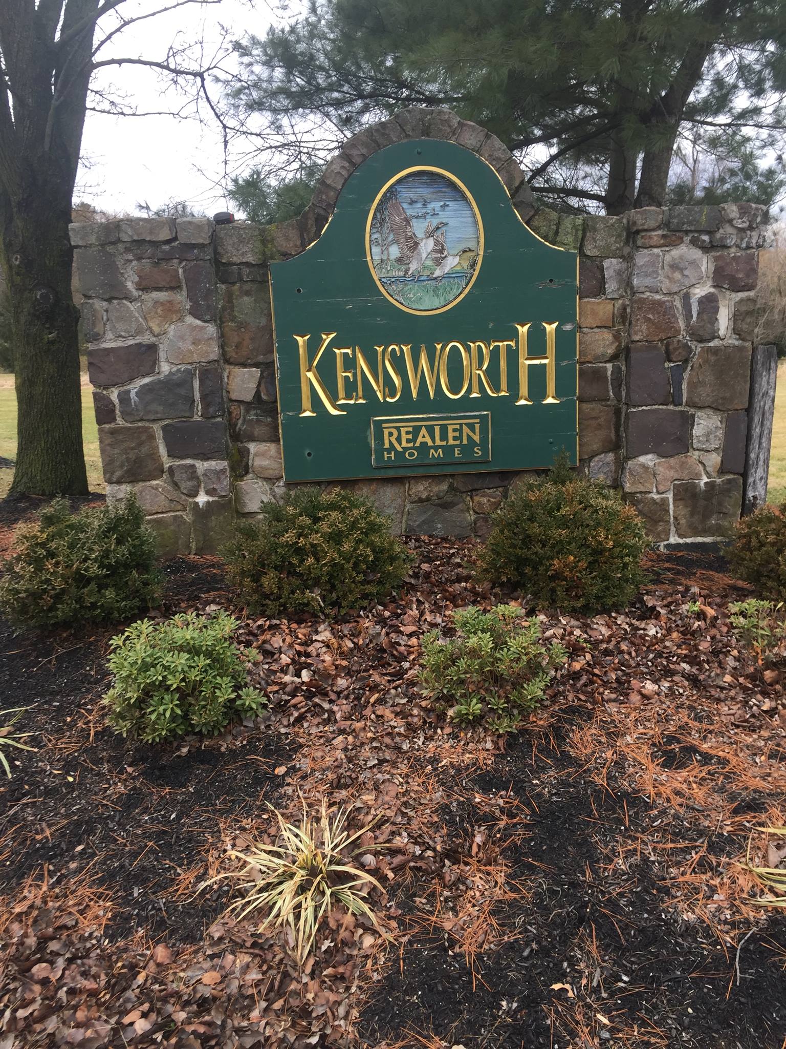Before and after pictures of a sign... - Dryburgh Hardscapes