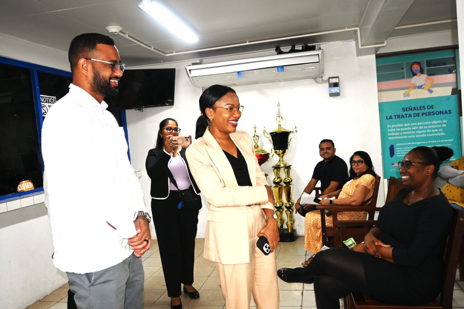 Hon.... - Hon. Oneidge Walrond, Minister of Home Affairs