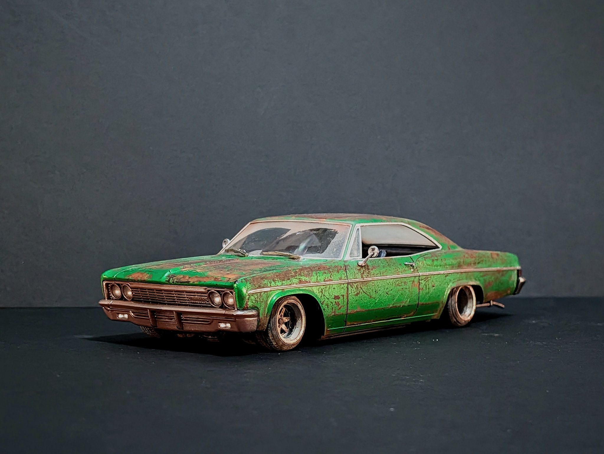 Revell 1/25 '66 Chevrolet Impala model with rust paint and custom