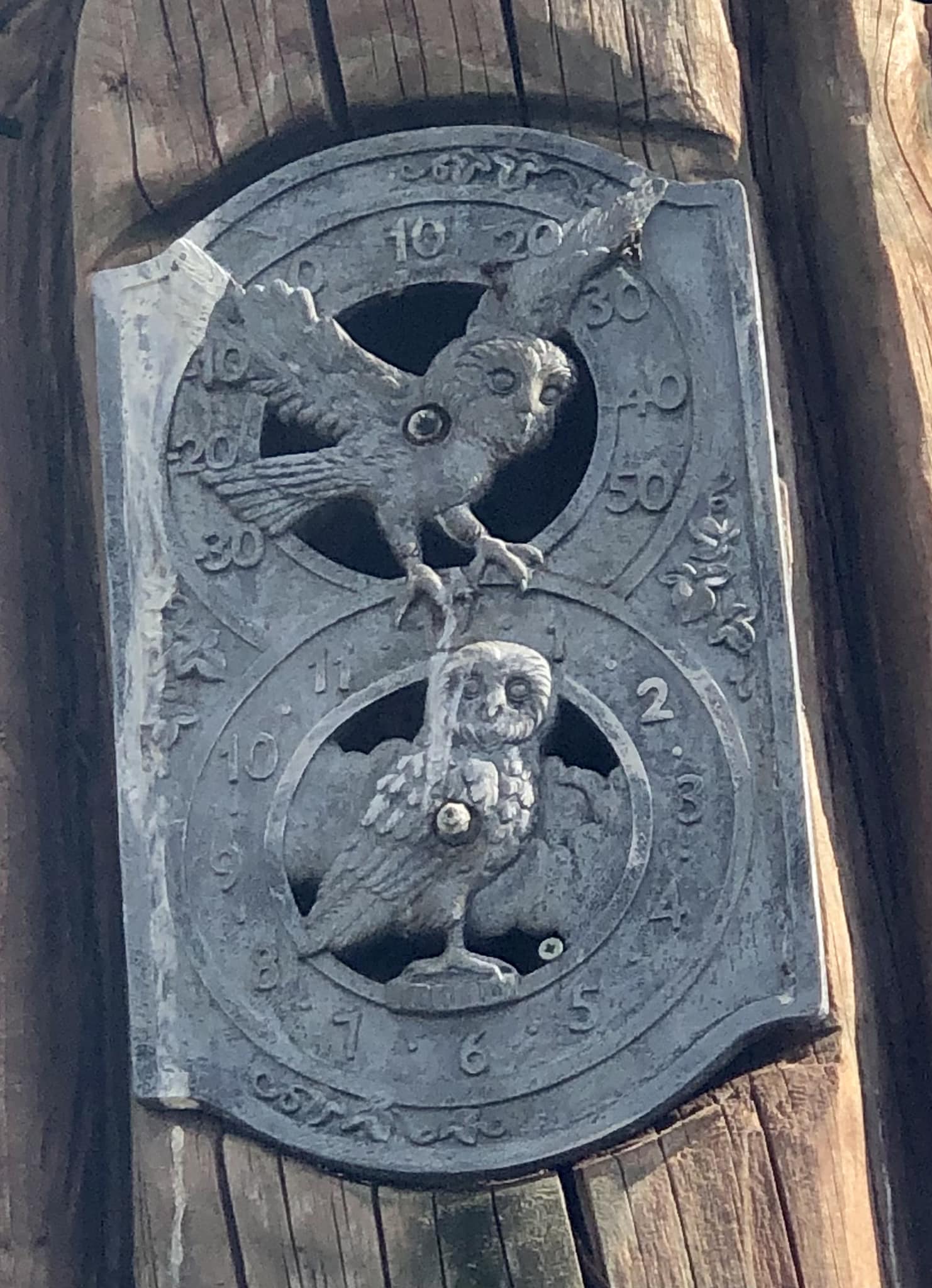 Ugly owl clock made from a loaf pan