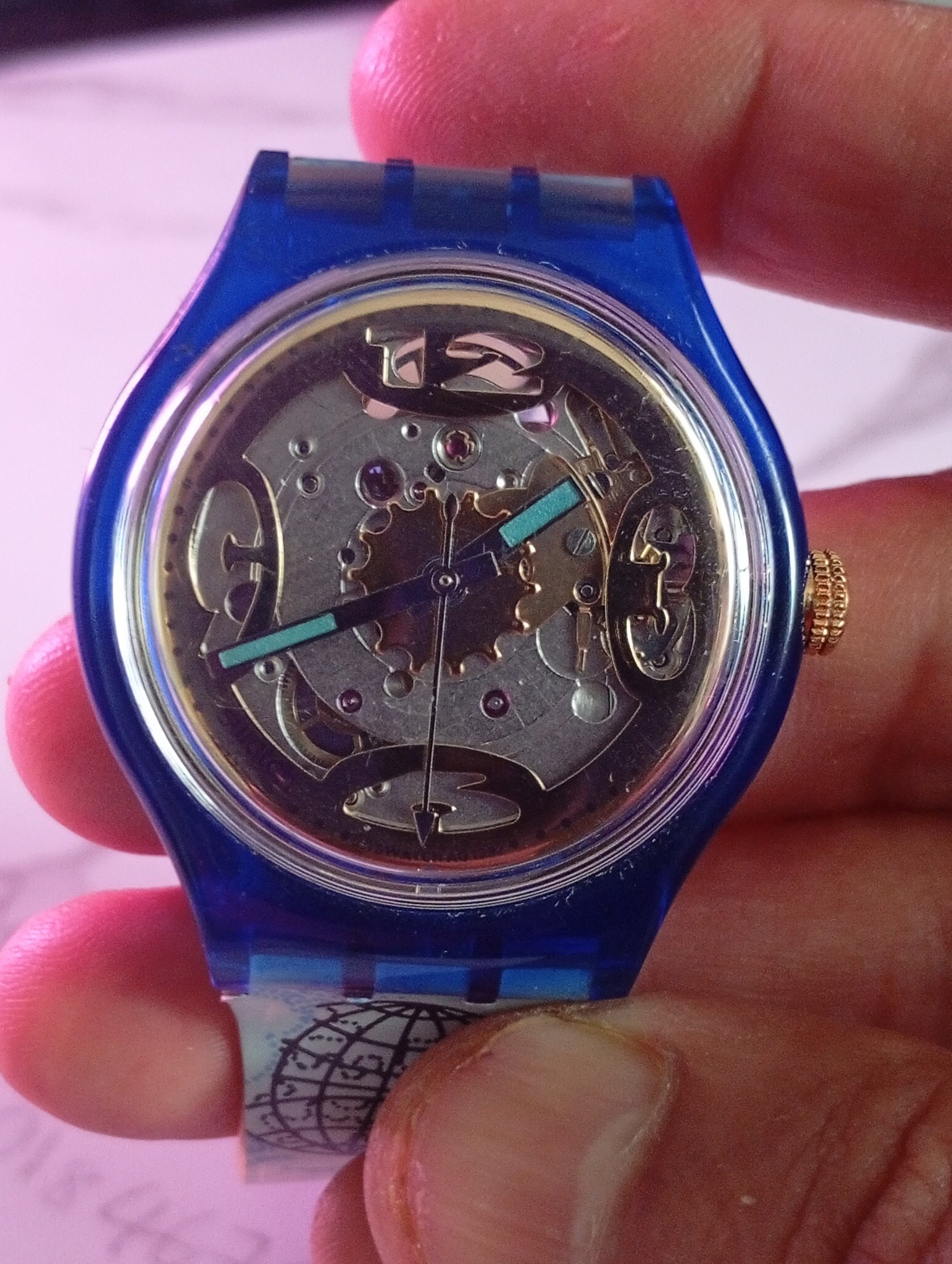 This watch is the Swatch Automatic Mappamondo (model number SAN101 