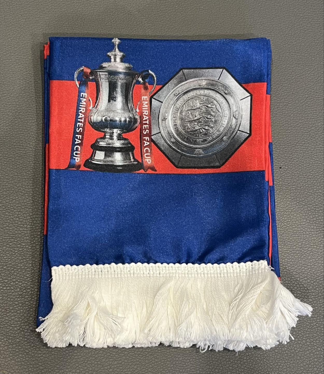A Crystal Palace fan has made these quality looking silk scarves