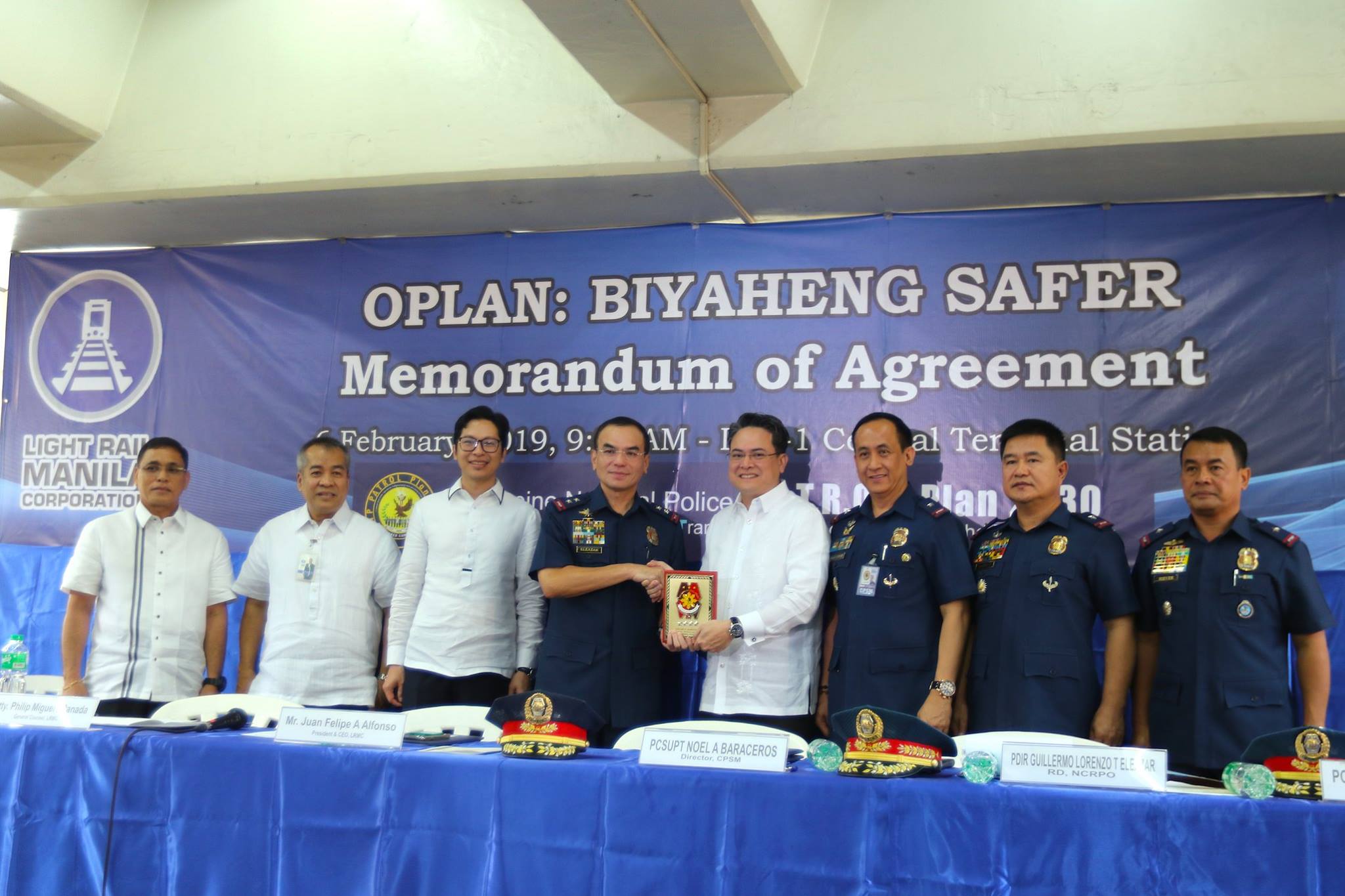 LRMC, PNP sign an... - Light Rail Manila Corporation