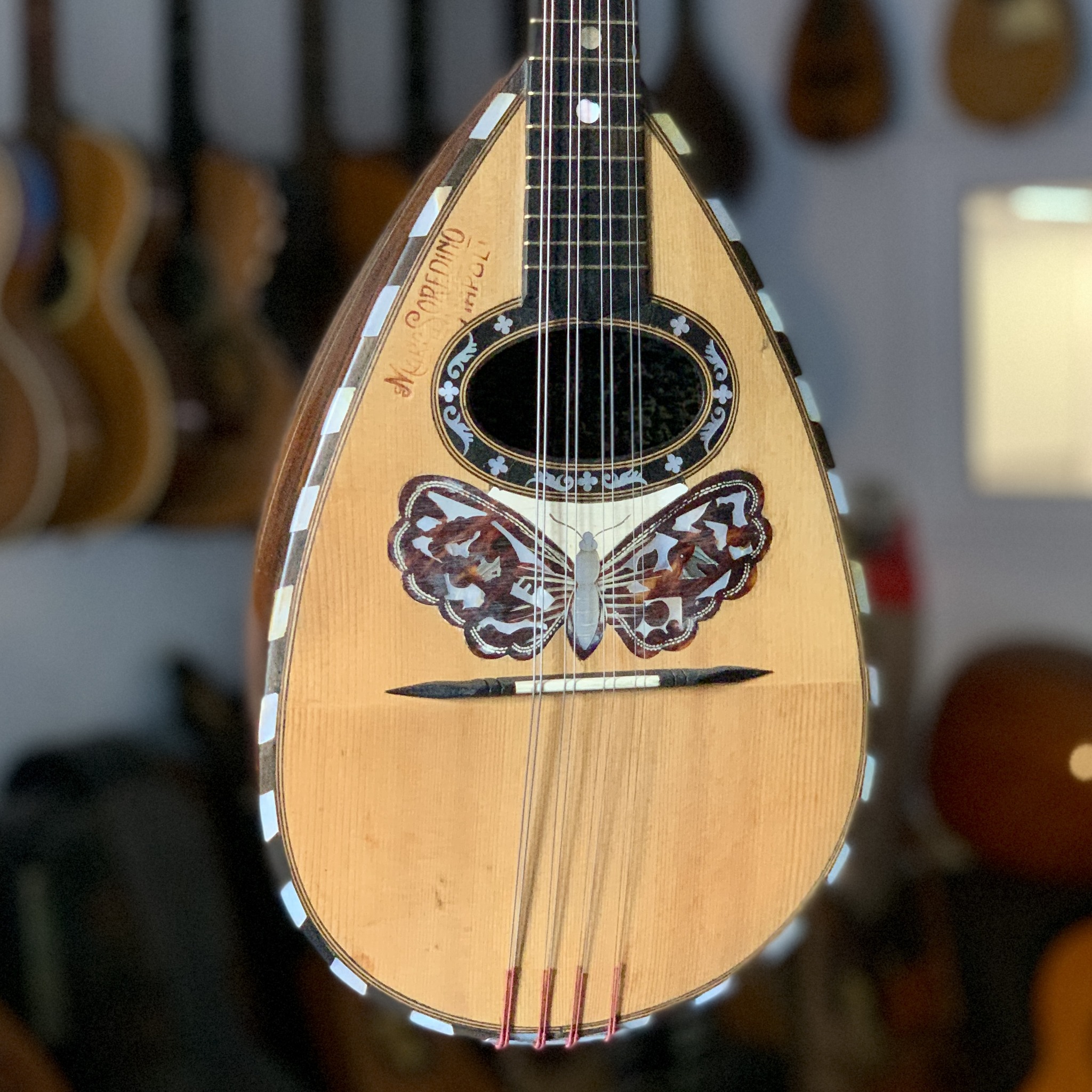 What is a Catania Carmelo mandolin worth?