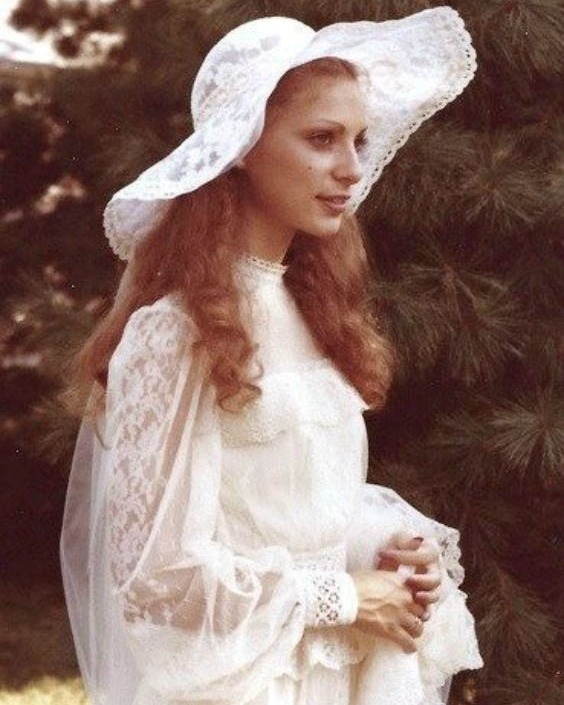 A Wedding in the 1970s. Look at those Bridesmaid Dresses!