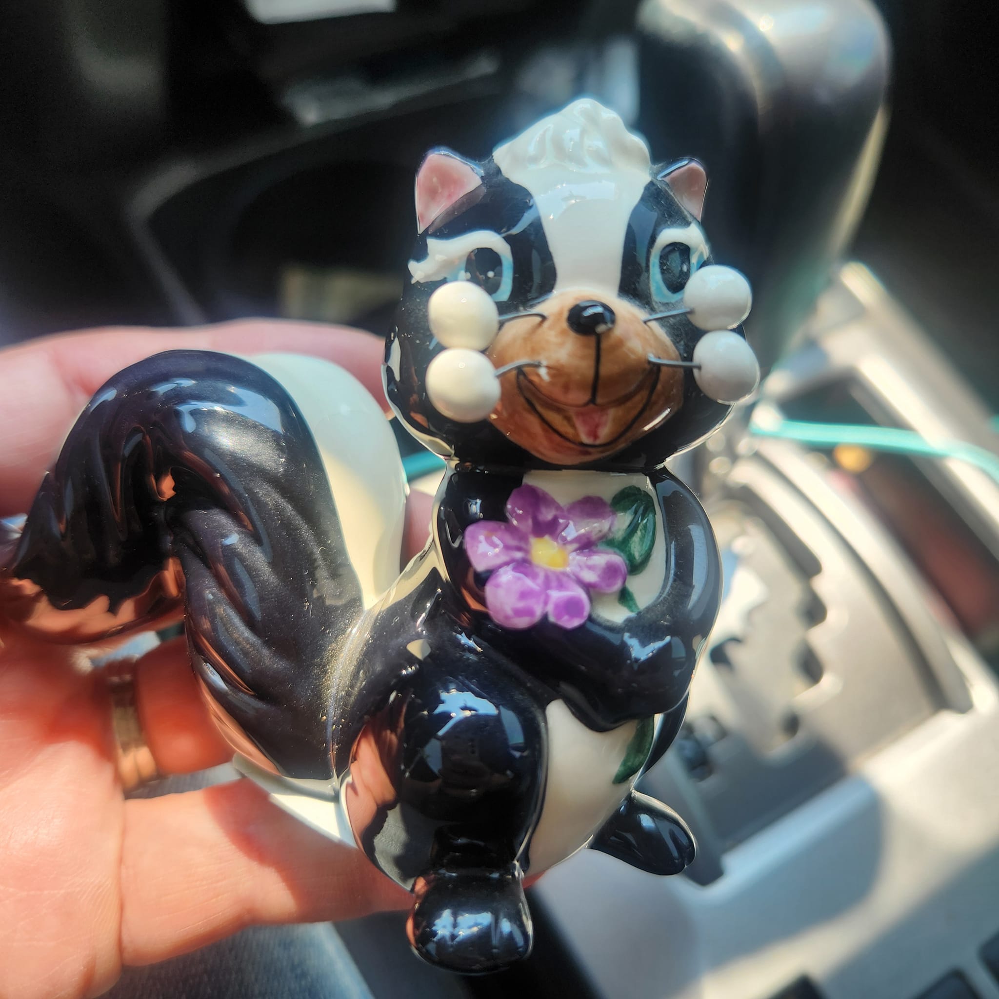 Vintage tiny skunk figurine from 1950s or 1960s