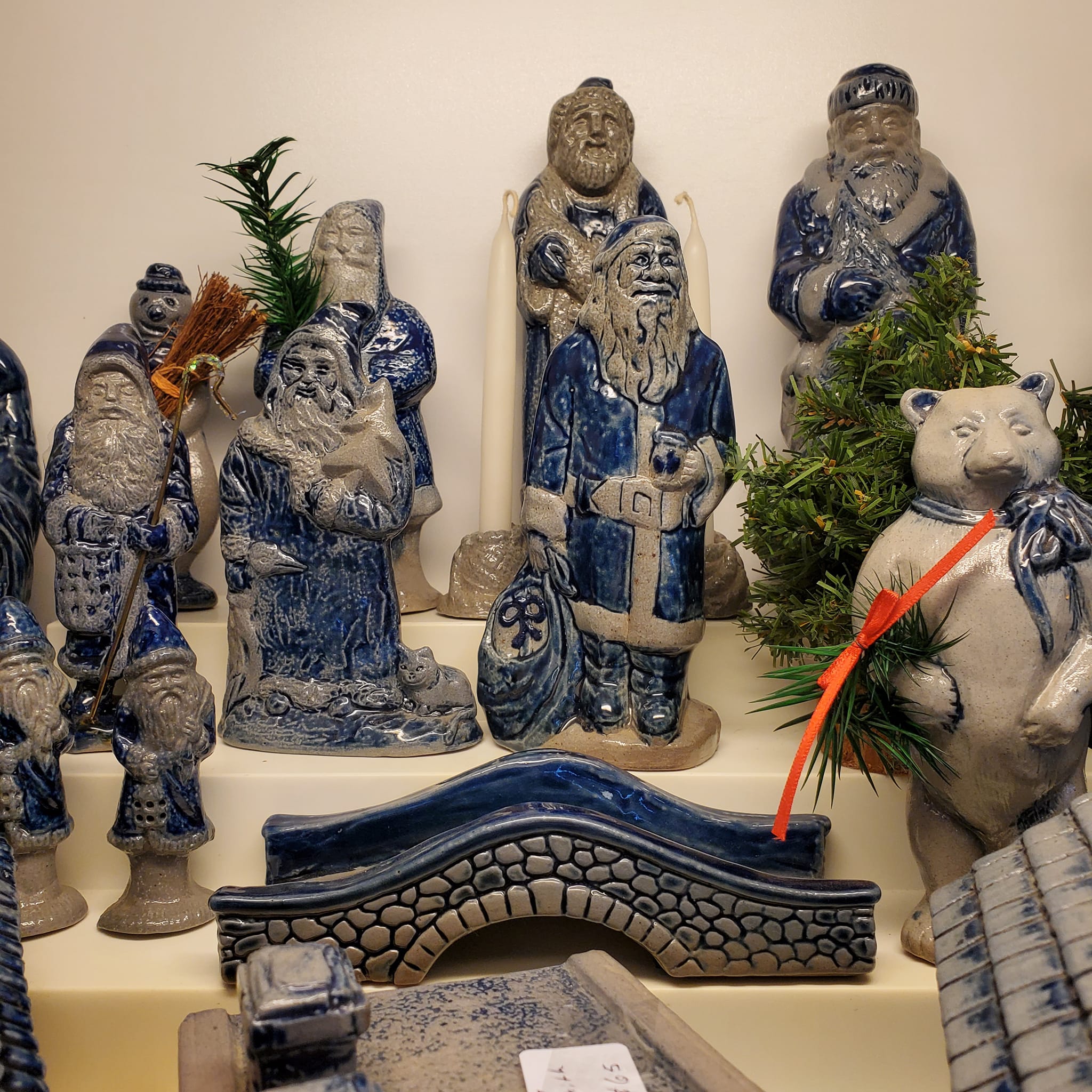 Rowe pottery Santas and village pieces at Five Star Antiques