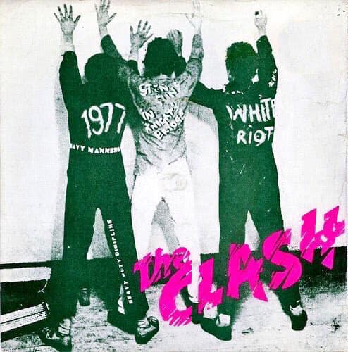 1977, The Clash release their debut single “White Riot”.