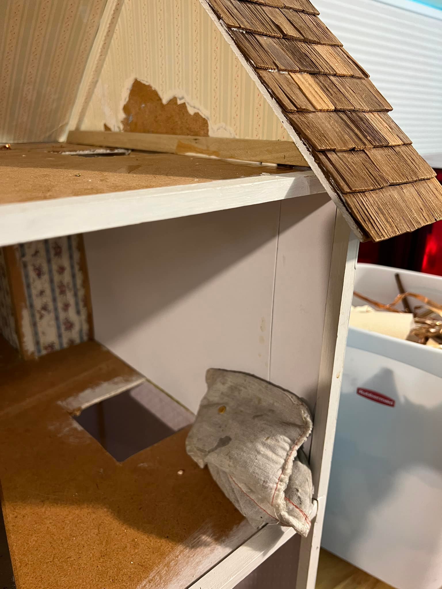 Renovating a Duracraft Victorian dollhouse with mat board and