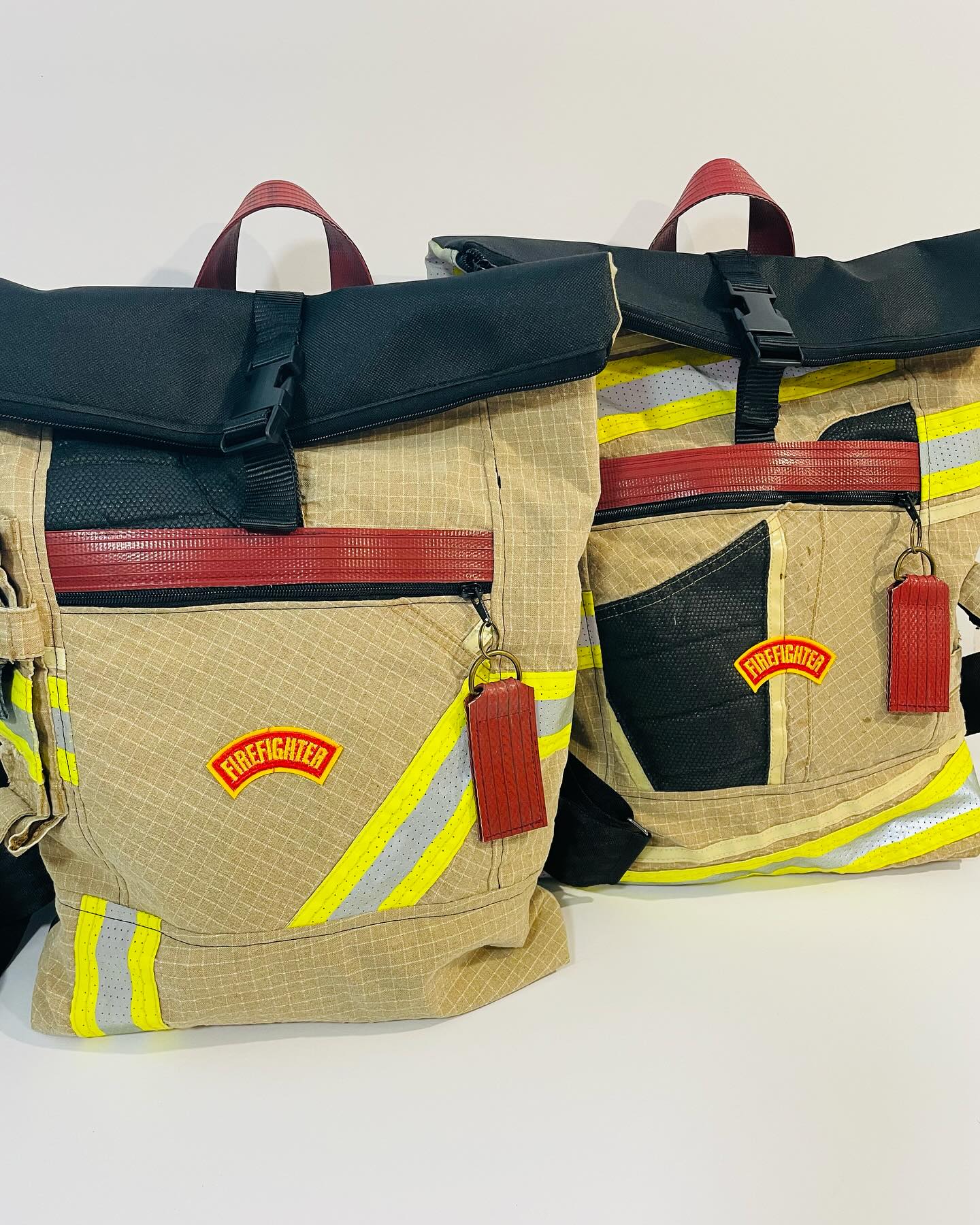 Upcycled fireman jacket with reflective poop bag pouch