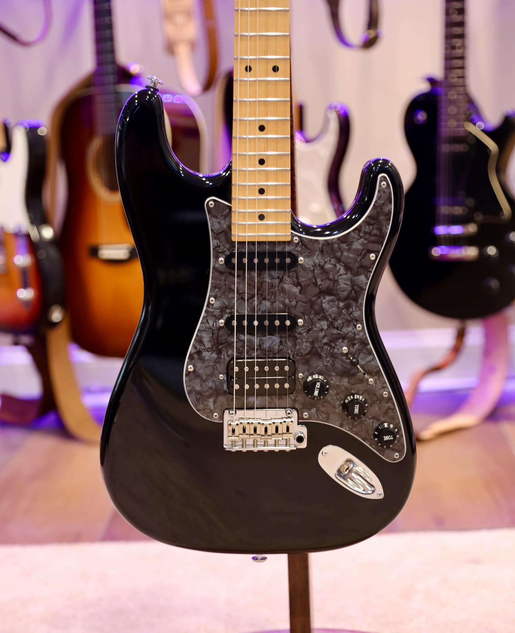 Suhr Classic Pro HSS guitar modification with black Pearloid pickguard