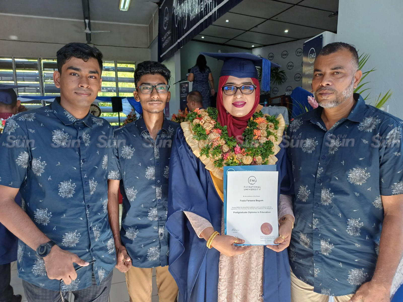 Fiji Sun - Graduates show off their certificates during...