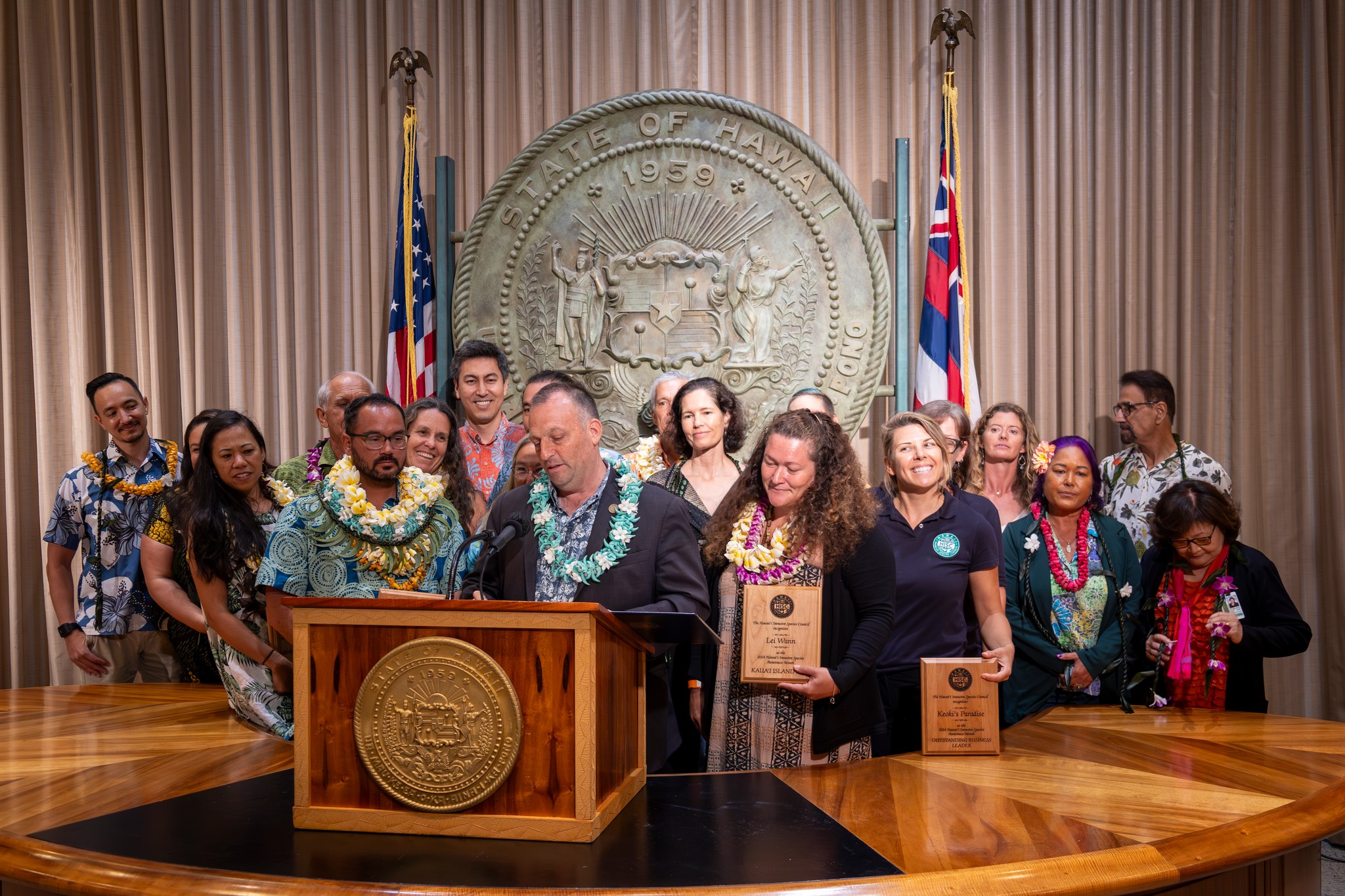 Hawaii - Kauaʻi MVP Awardee, Lei Wann (right), watches as Governor ...